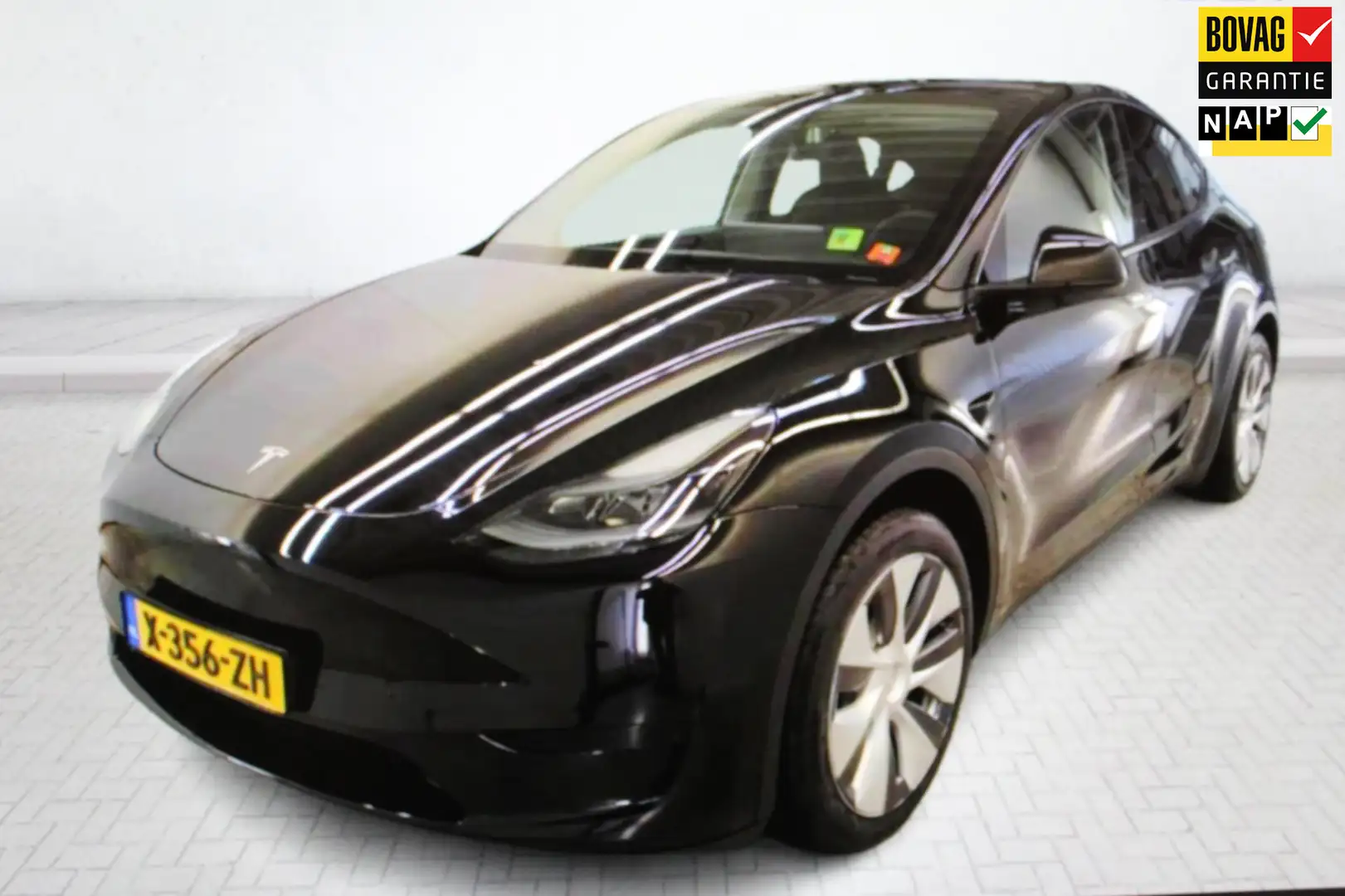 Tesla Model Y RWD Plus 60 kWh TREKHAAK / 1e EIG. / LAGE KM!! / L Zwart - 1