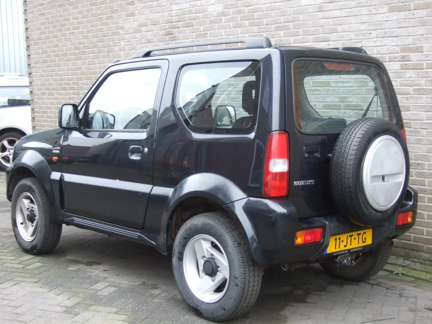 Suzuki Jimny 1.3 Special - 4WD - Airco - Trekhaak - Negro - 2