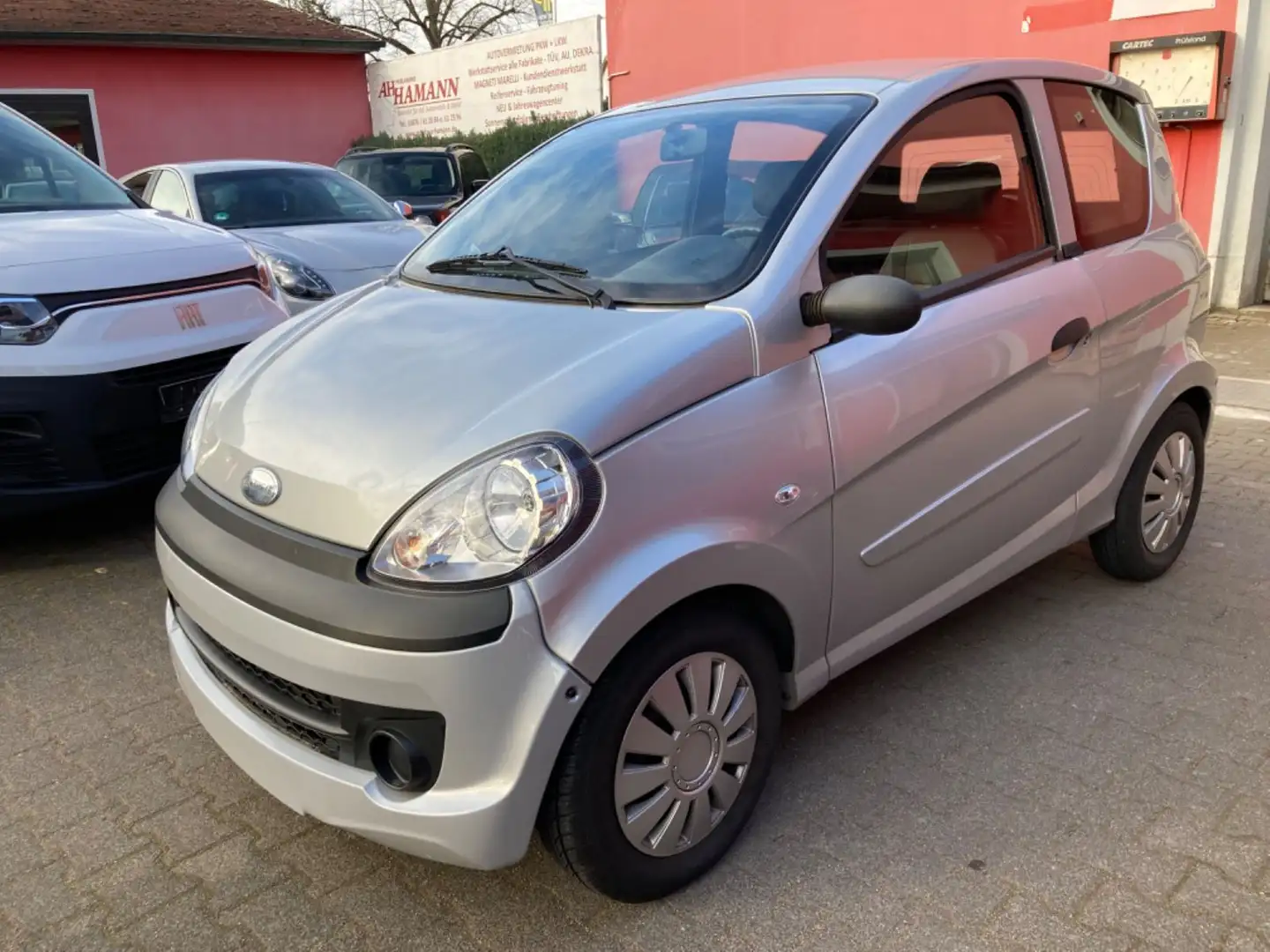 Microcar M.Go -45KM/H-Mopedauto-1.-HD-AIRBAG- Zilver - 1