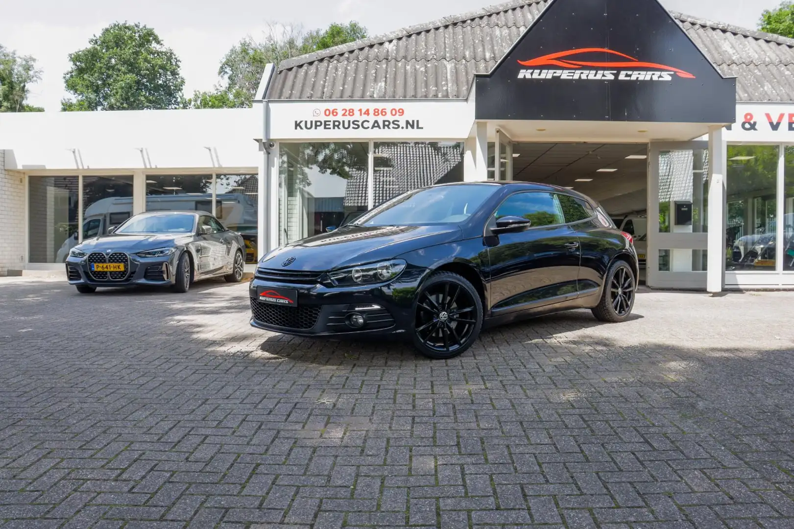 Volkswagen Scirocco 2.0 TSI Highline NAP/Xenon/Clima/18"/Dealer Zwart - 1