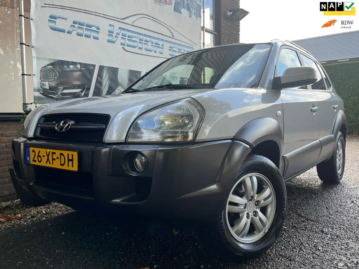 Hyundai TUCSON 2.0i Style Premium|Airco|Trekhaak|Leder|Cruise| Gris - 1