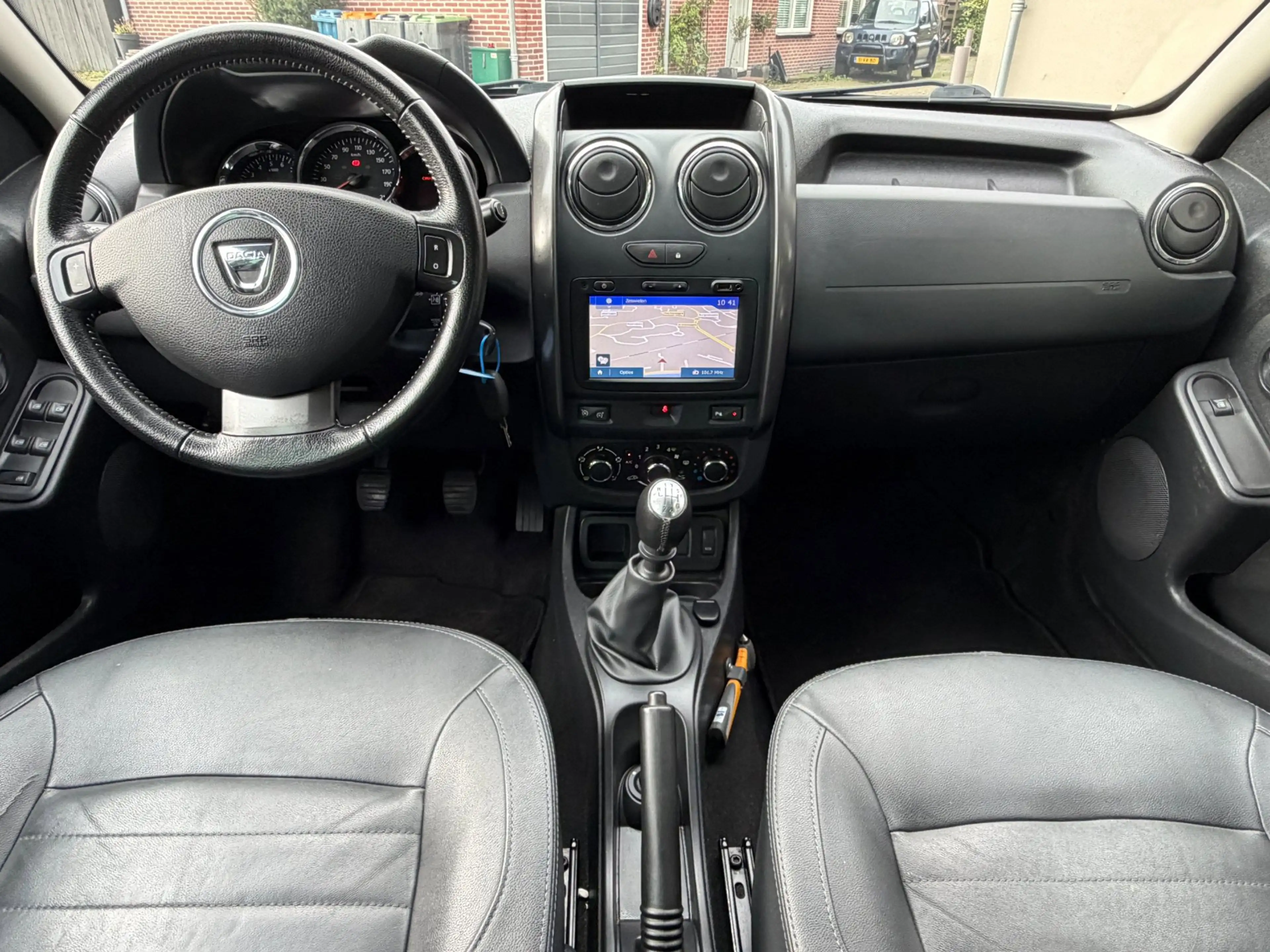 Dacia Duster 1.2 TCe 4x2 Prestige Leer Navi Cruise Airco Trekha — photo 11