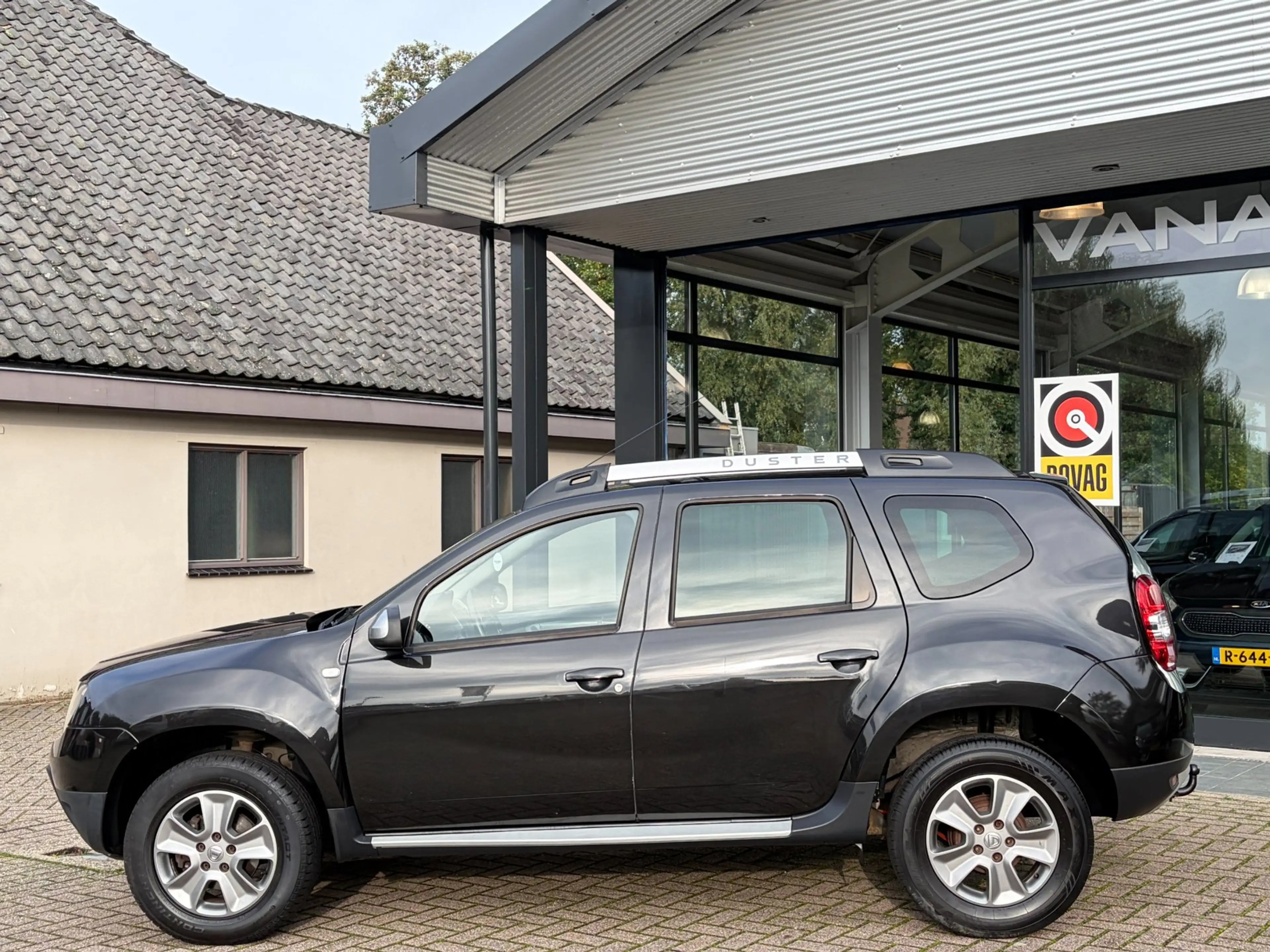 Dacia Duster 1.2 TCe 4x2 Prestige Leer Navi Cruise Airco Trekha — photo 2