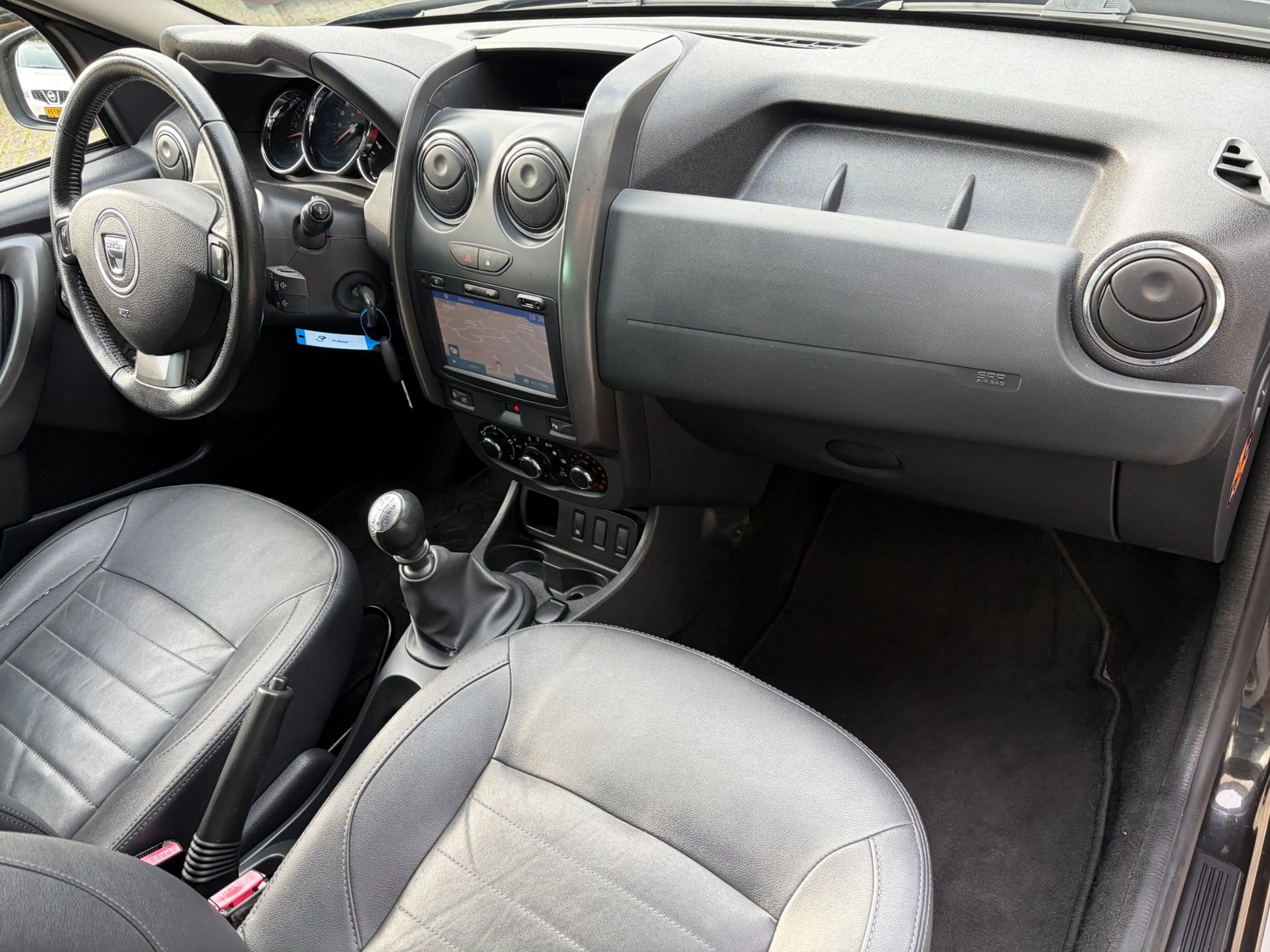 Dacia Duster 1.2 TCe 4x2 Prestige Leer Navi Cruise Airco Trekha — photo 9