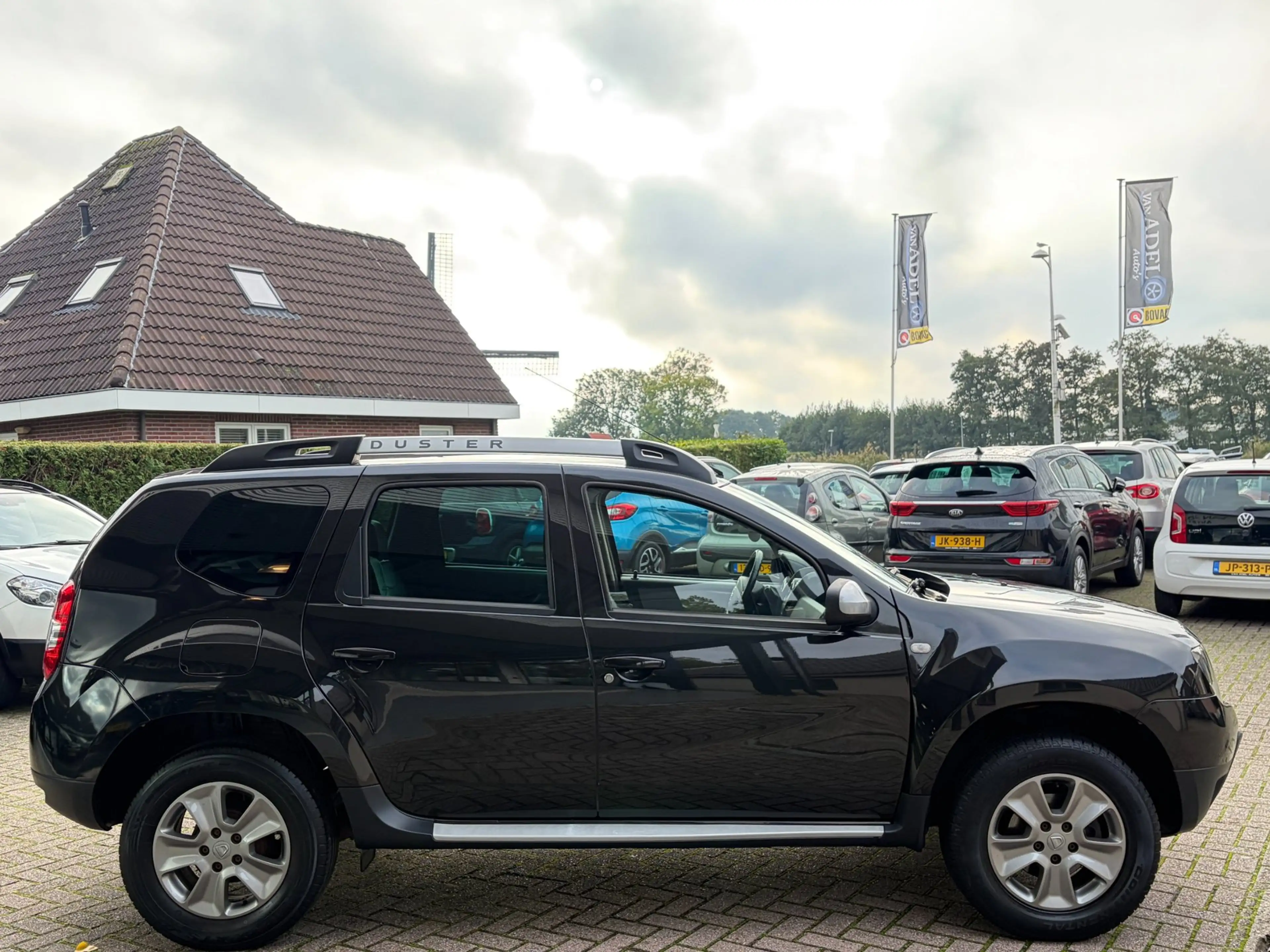 Dacia Duster 1.2 TCe 4x2 Prestige Leer Navi Cruise Airco Trekha — photo 5