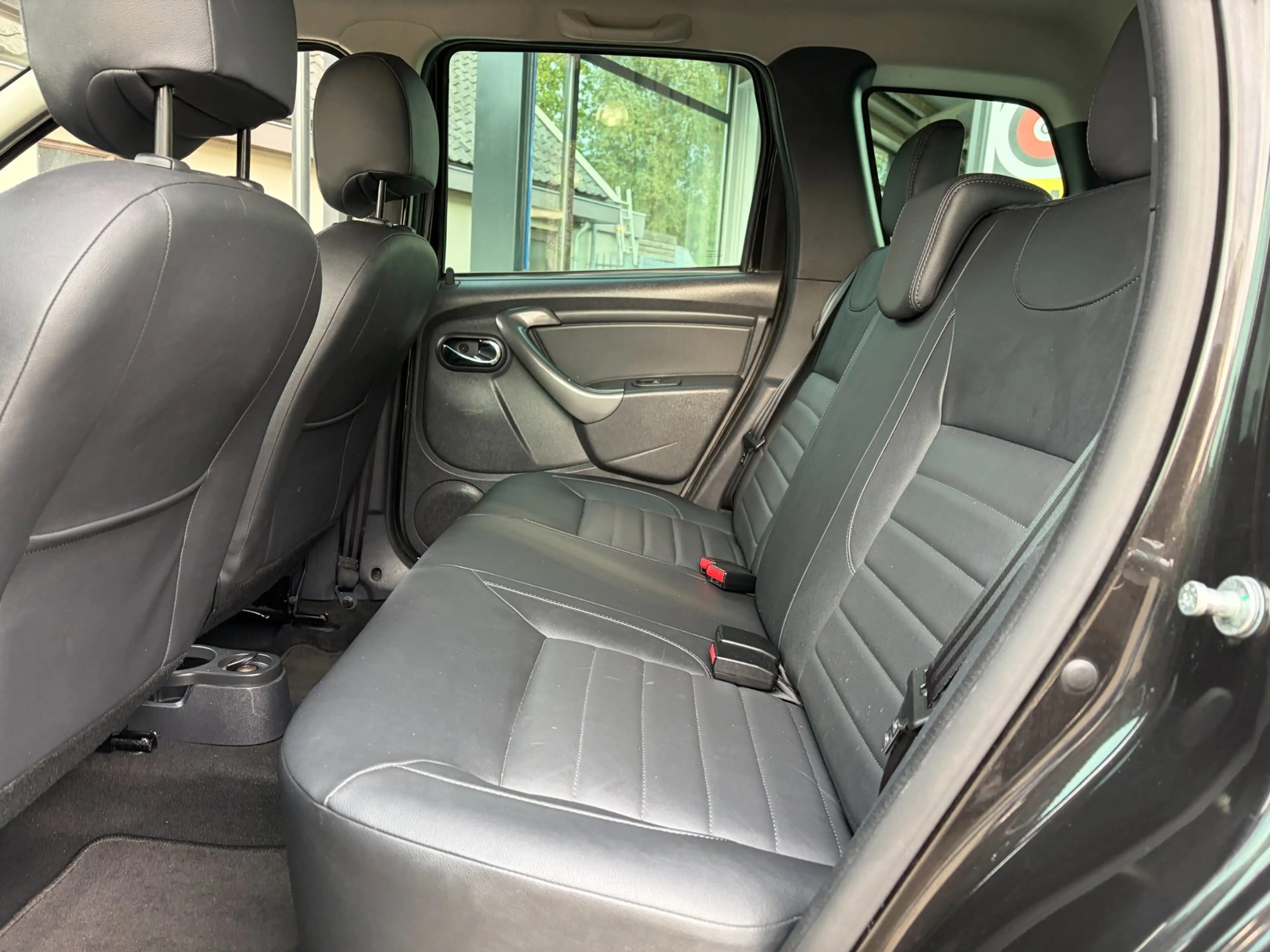 Dacia Duster 1.2 TCe 4x2 Prestige Leer Navi Cruise Airco Trekha — photo 18