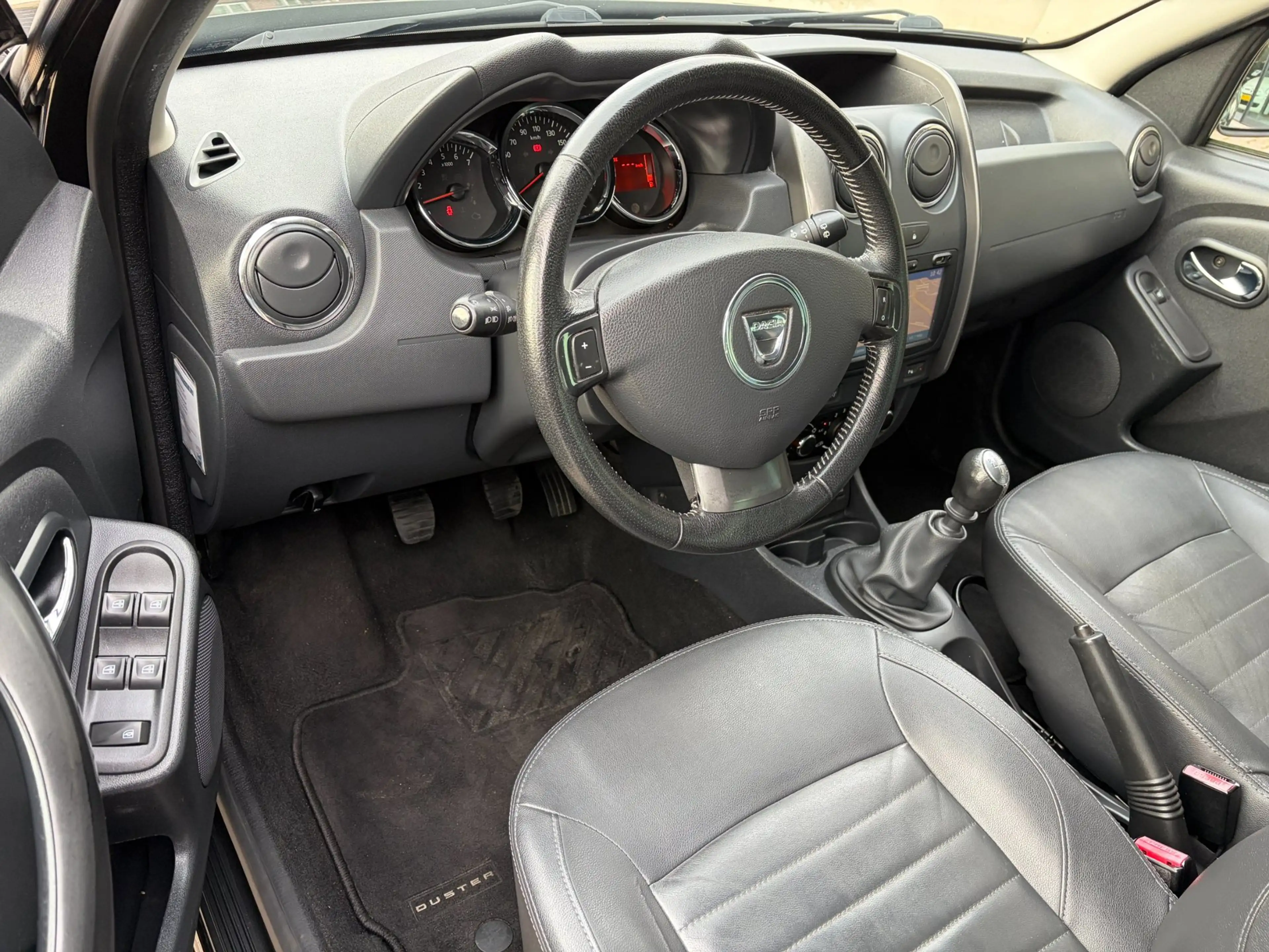 Dacia Duster 1.2 TCe 4x2 Prestige Leer Navi Cruise Airco Trekha — photo 14