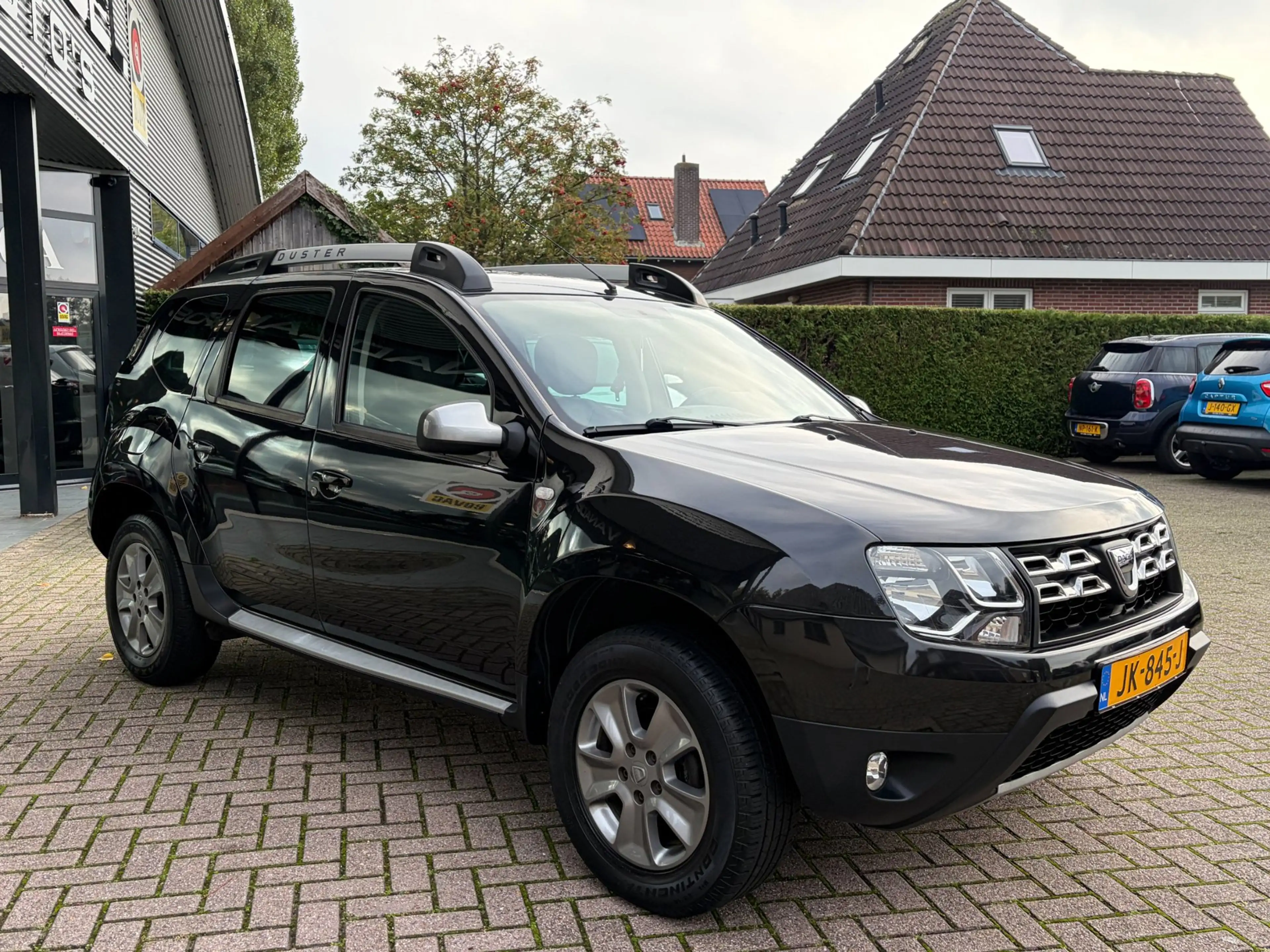 Dacia Duster 1.2 TCe 4x2 Prestige Leer Navi Cruise Airco Trekha — photo 6