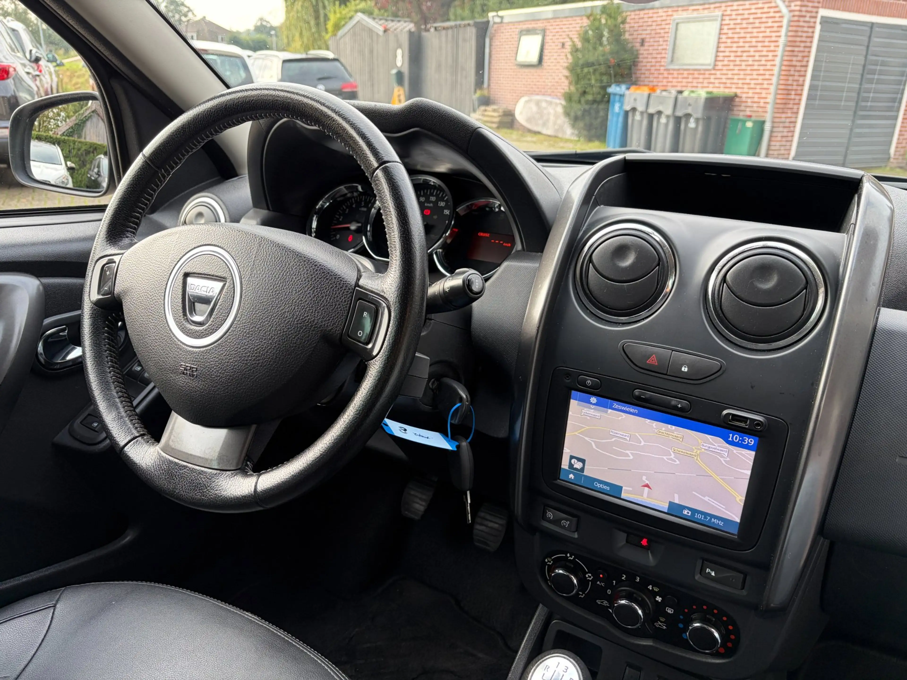 Dacia Duster 1.2 TCe 4x2 Prestige Leer Navi Cruise Airco Trekha — photo 10