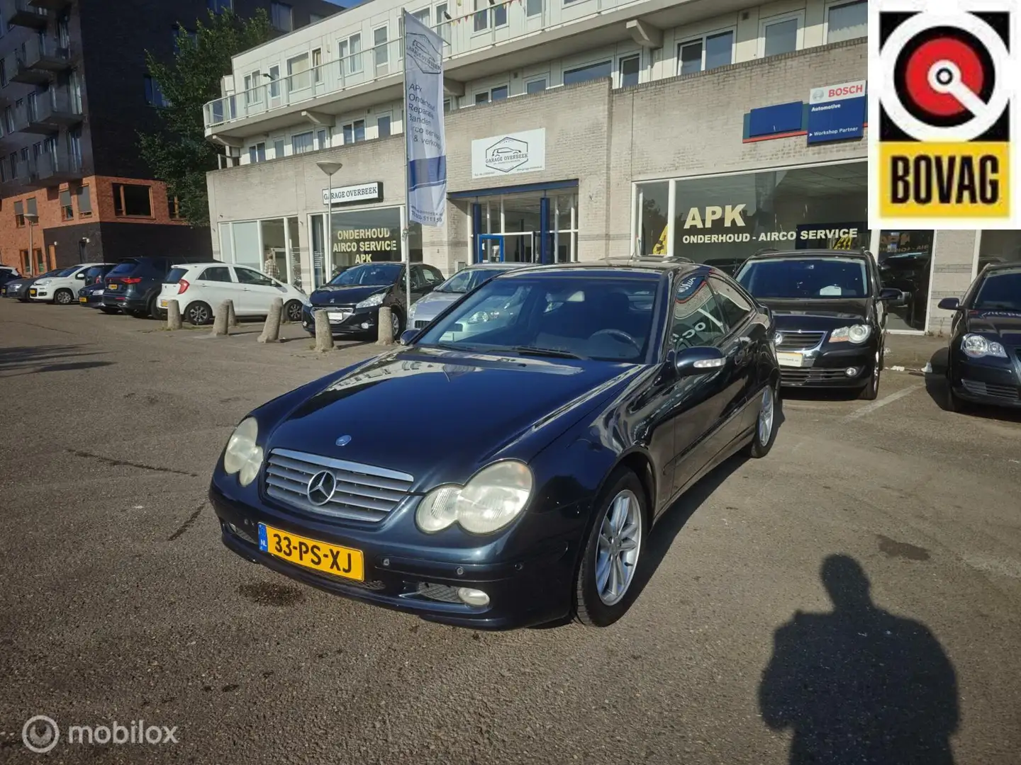 Mercedes-Benz C 180 Sportcoupé 2004 CRUISE/LMV/PDC/NWE APK Zwart - 1