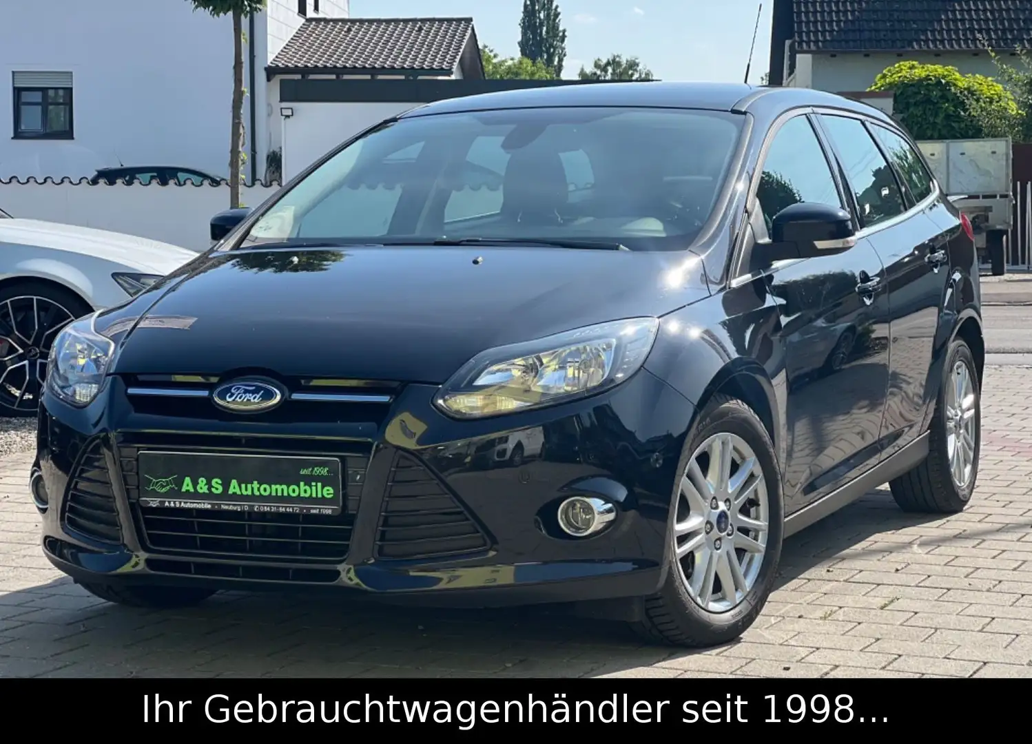 Ford Focus Turnier 1.0 EB Titanium *NAVI/PDC/SHZ/TEMP Schwarz - 1