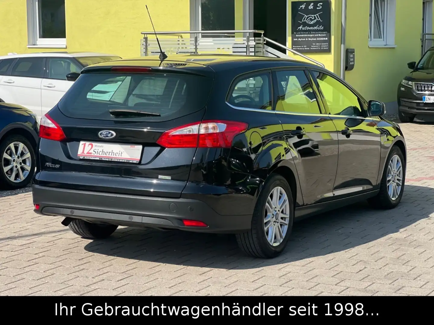 Ford Focus Turnier 1.0 EB Titanium *NAVI/PDC/SHZ/TEMP Schwarz - 2