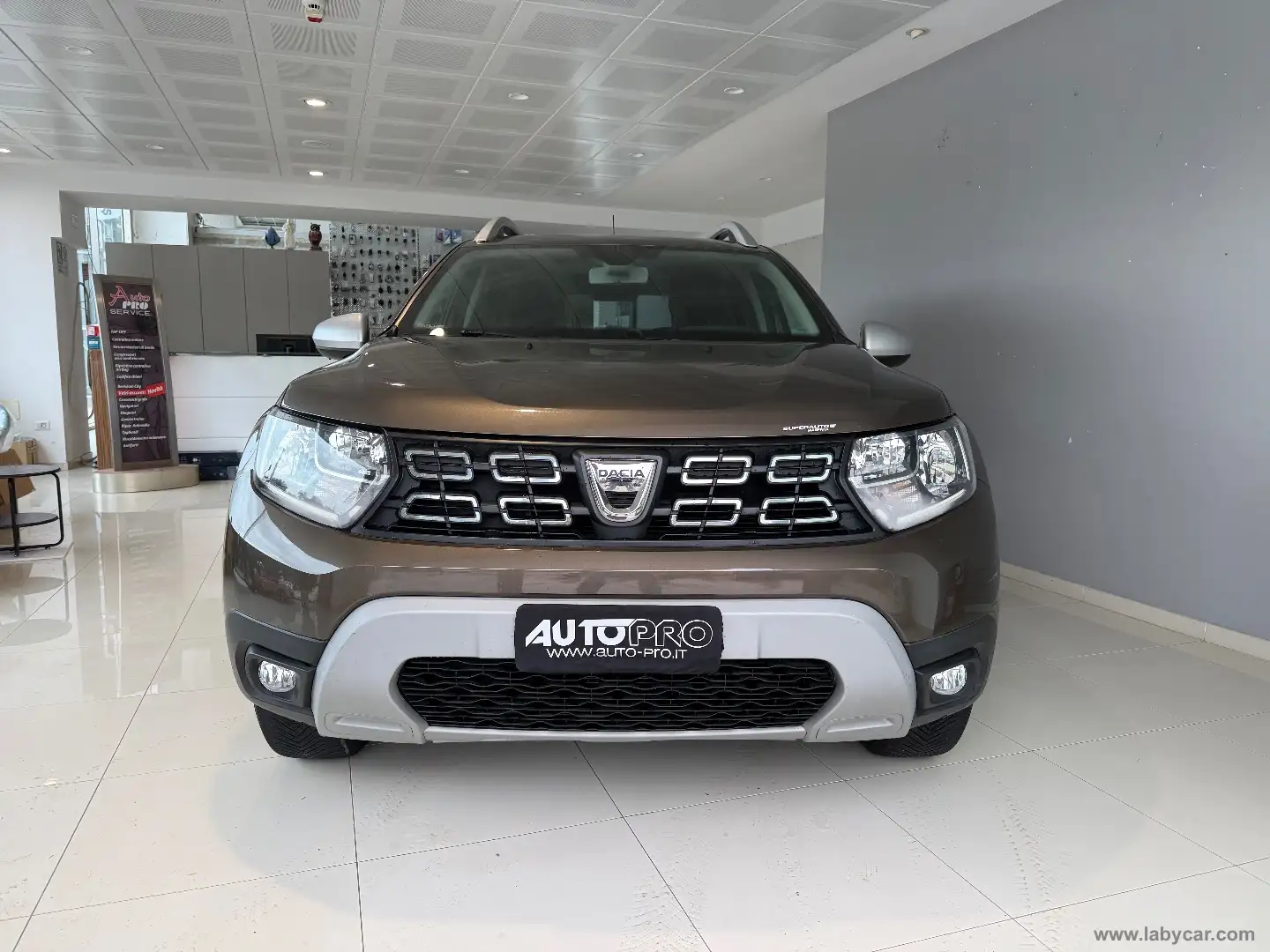 Dacia Duster 1.6 SCe GPL 4x2 Prestige Bronze - 1