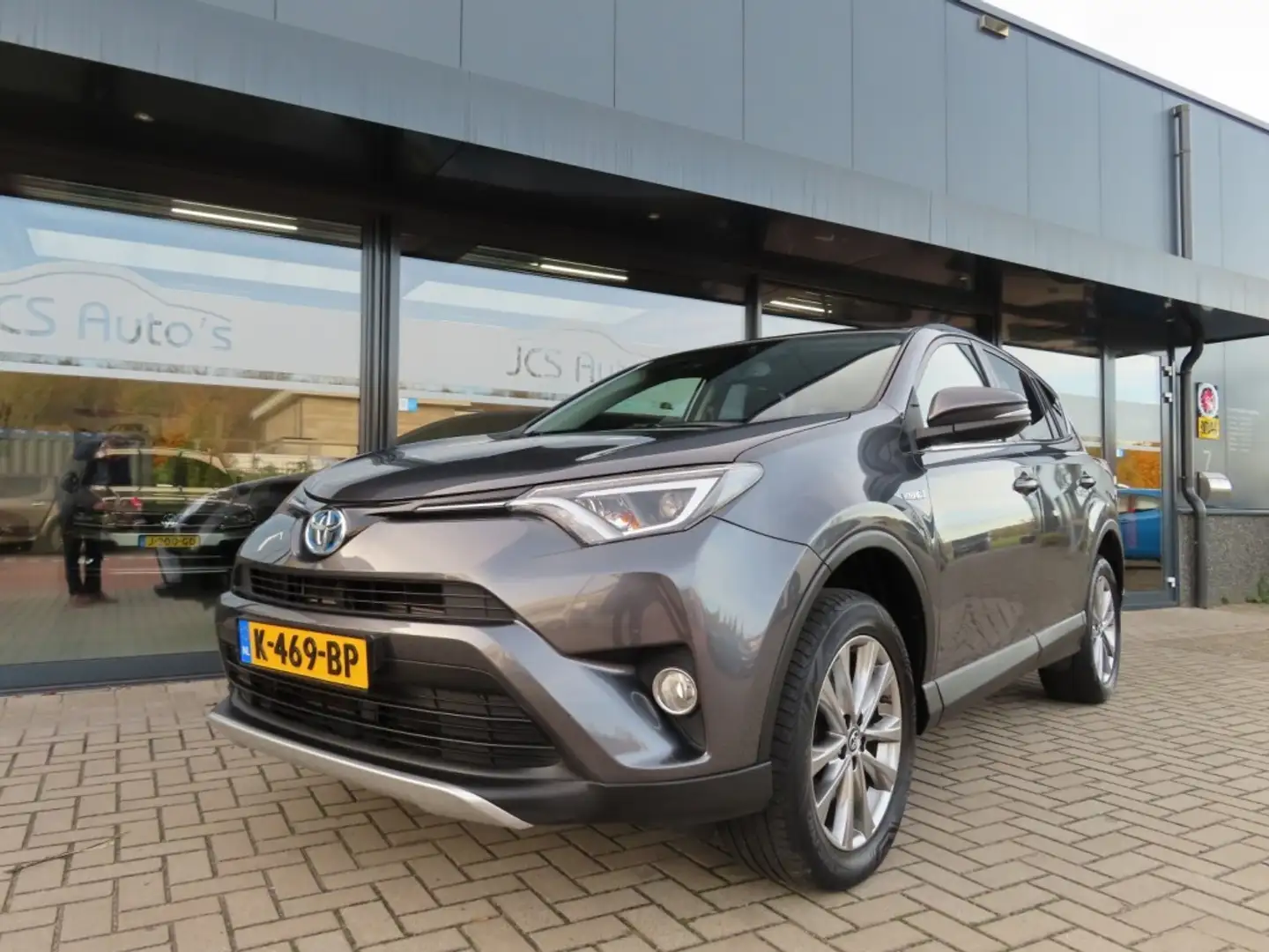 Toyota RAV 4 2.5 HYBRID AWD Ecc Navi Camera Trekhaak 2016 Grijs - 1