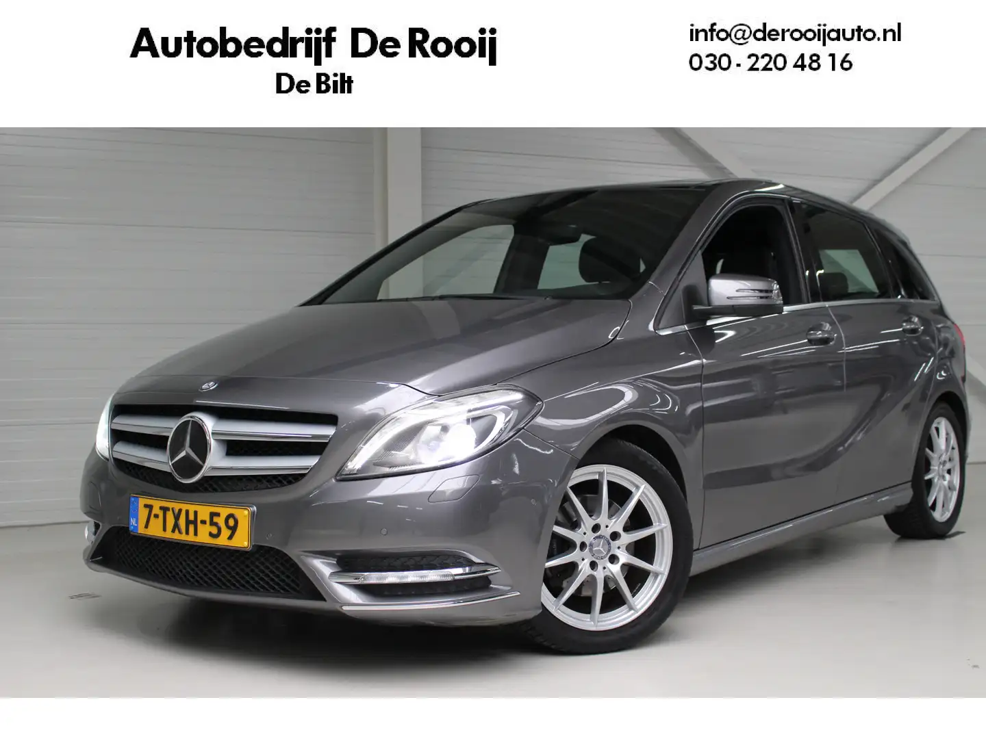 Mercedes-Benz B 180 Ambition Comfort Panoramadak | Navigatie | Parkeer Grijs - 1