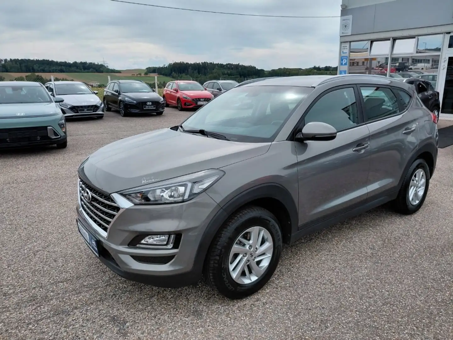 Hyundai TUCSON Level 3 RUN 1,6 GDi 2WD MT Grau - 1