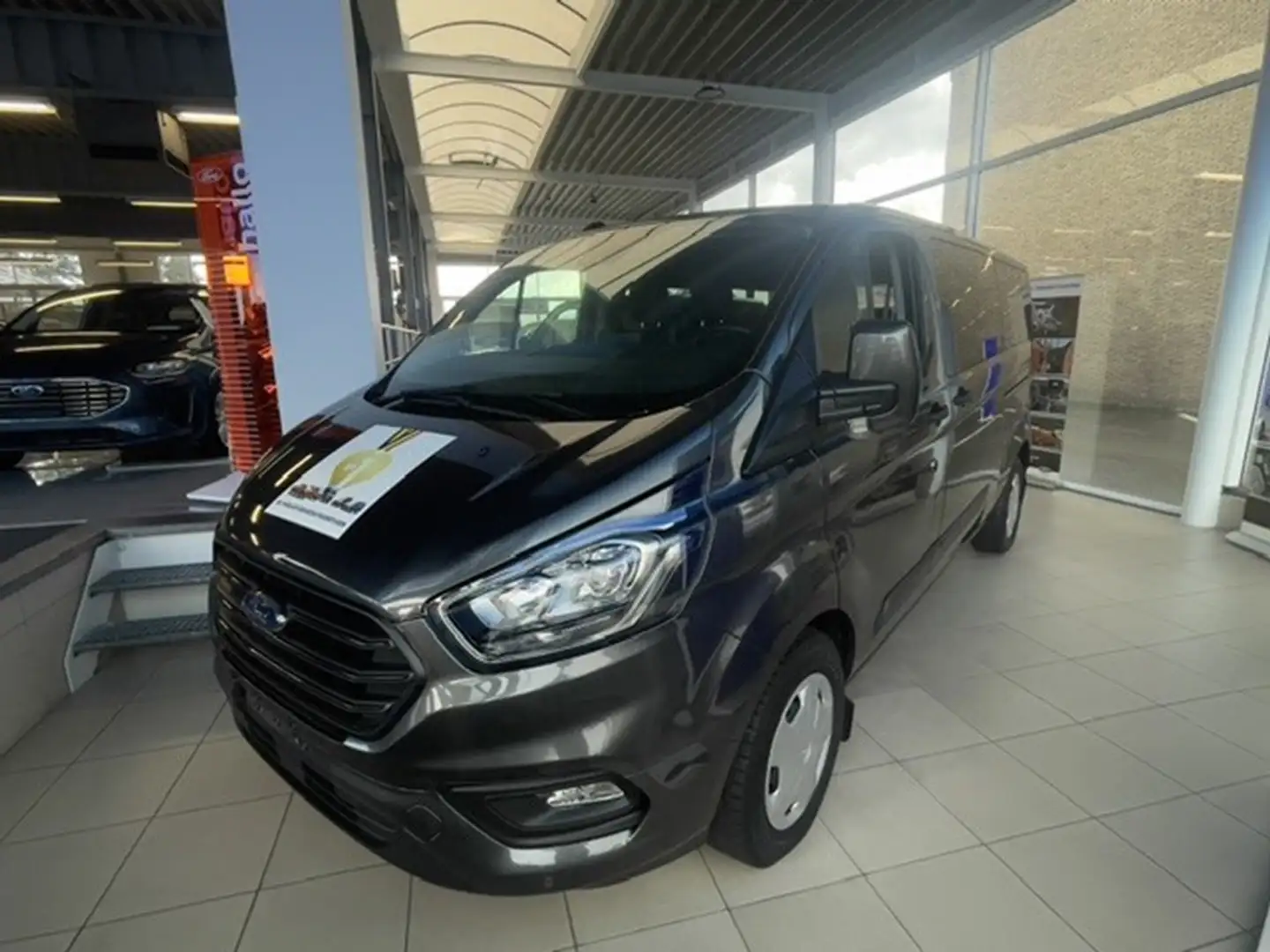 Ford Tourneo Custom 340L 2.0 Ecoblue 130pk M6 Garantie tot 1/07/24 of Gris - 1