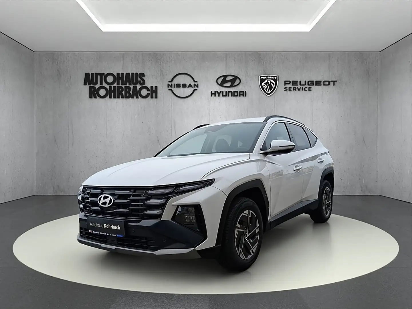 Hyundai TUCSON Tucson 1,6 T-GDI HEV 4WD Jubilé Aut. Weiß - 1