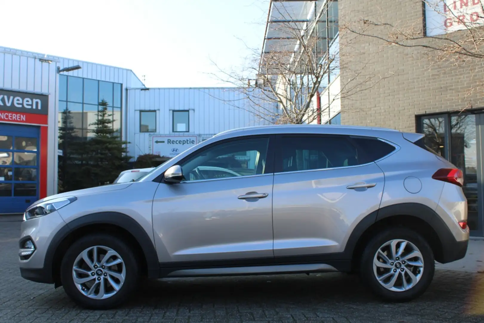 Hyundai TUCSON 1.6 GDi Comfort Navi/Cam/Pdc 2x/Winterp./Trekhaak Blanc - 2