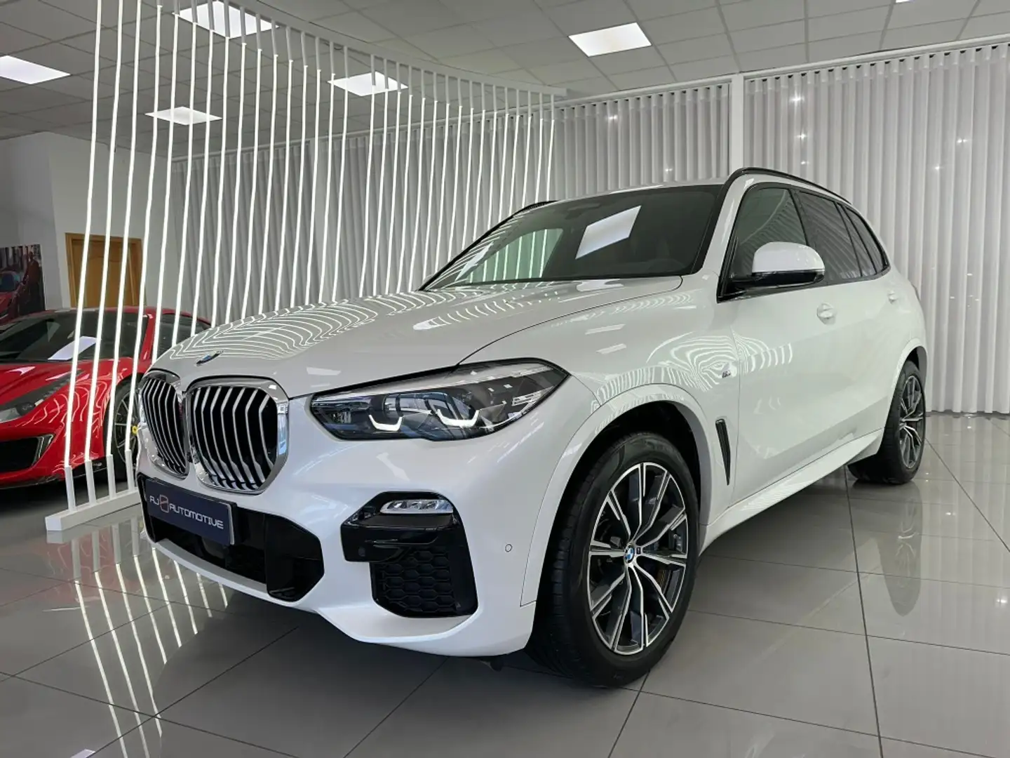 BMW X5 xDrive 30dA Wit - 1