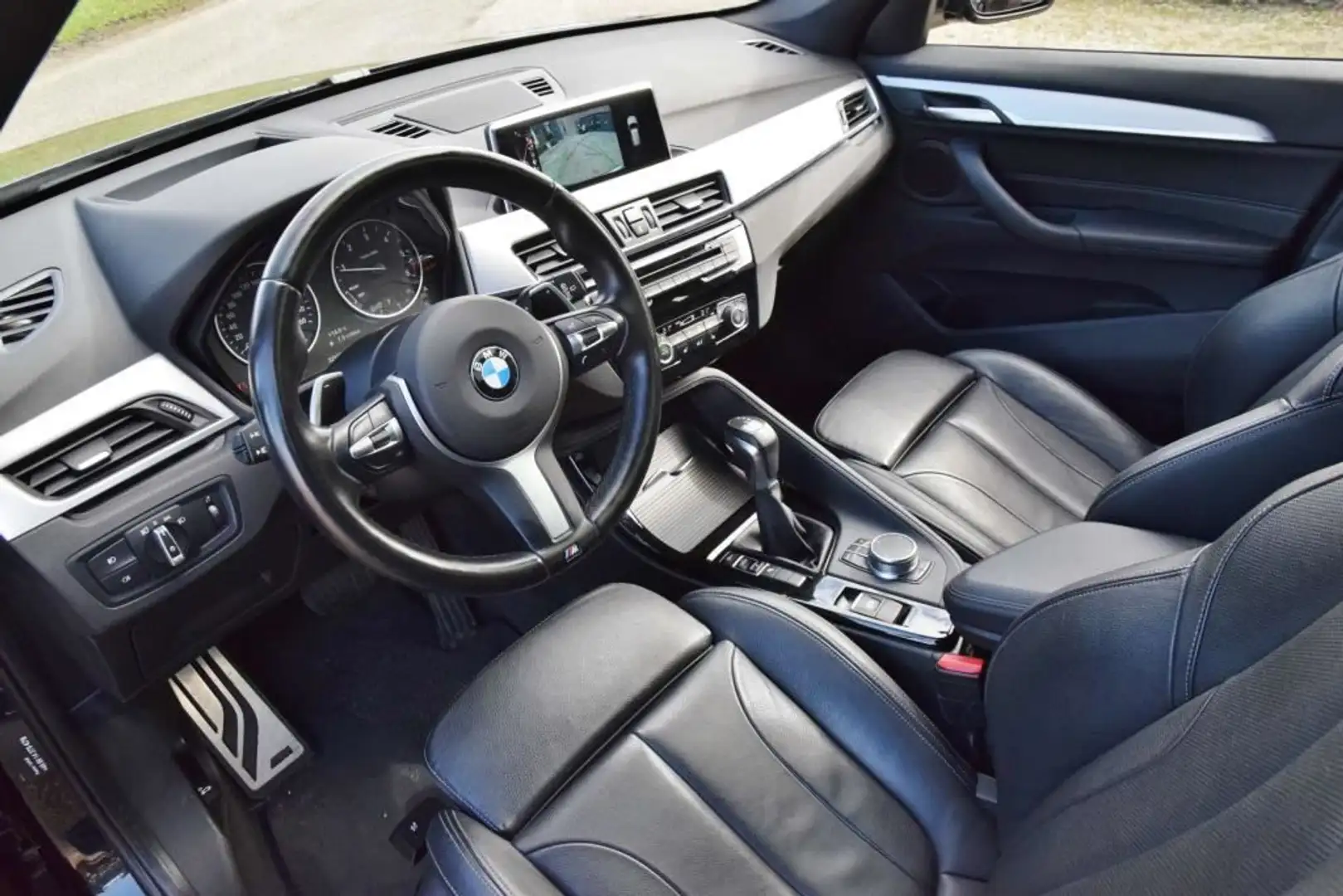 BMW X1 18d sDrive High Executive / head-up display / pano Zwart - 2