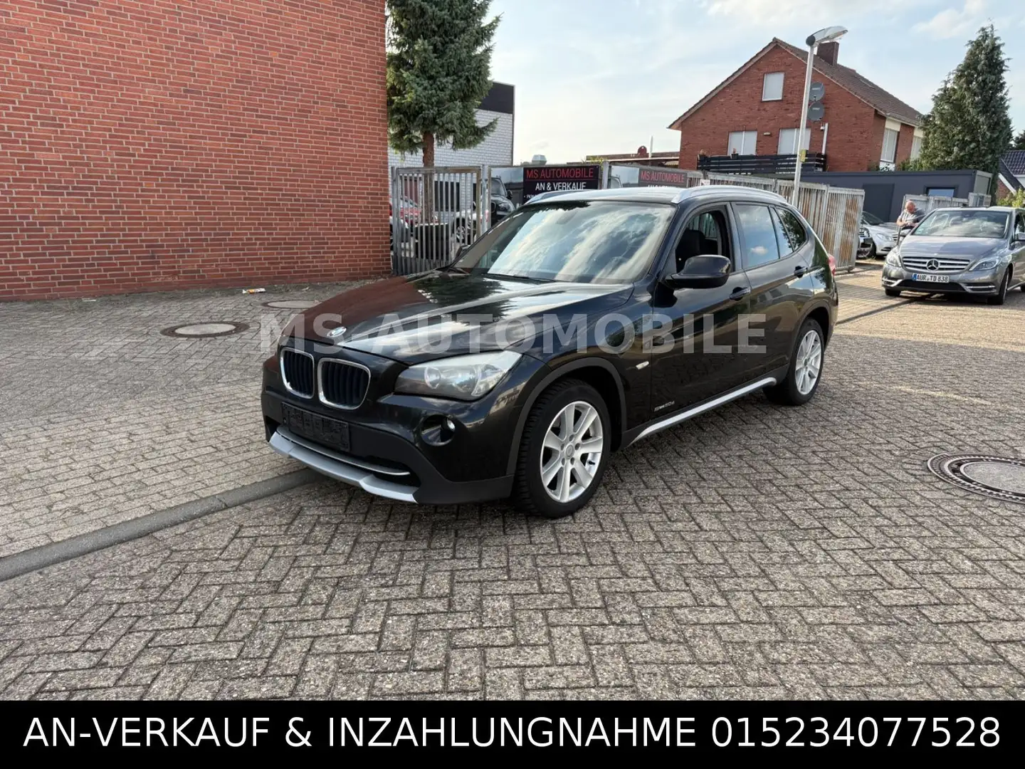 BMW X1 20 d sDrive * 177-PS * NAVI * Zwart - 1
