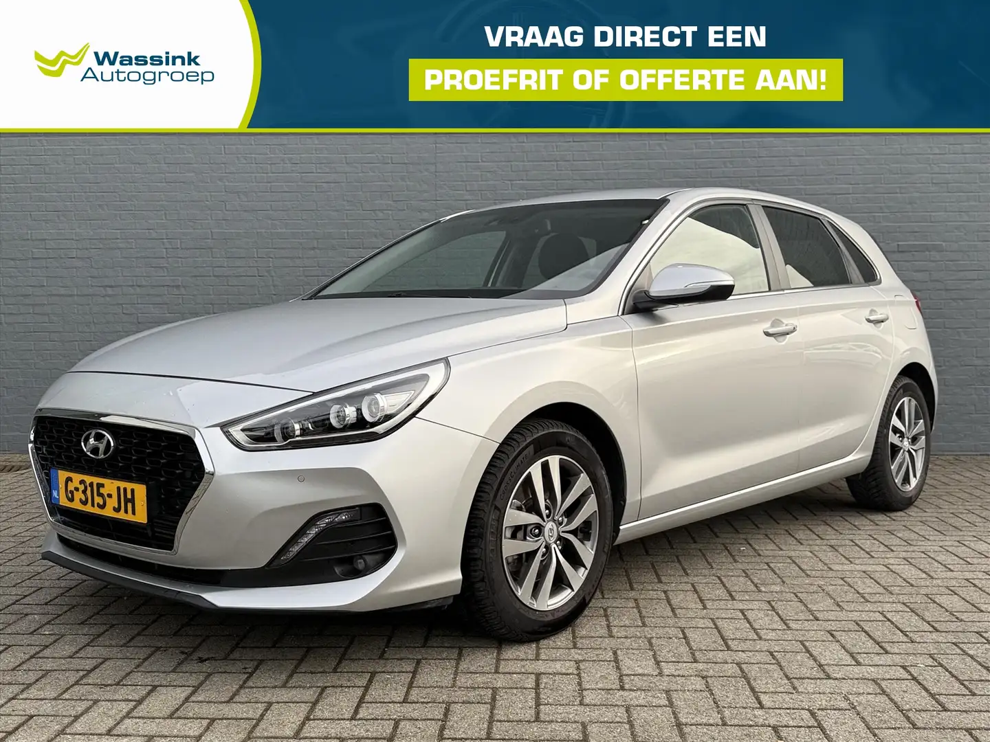 Hyundai i30 1.0 T-GDi 120pk Premium | Navigatie | Privacy Glas Gris - 1