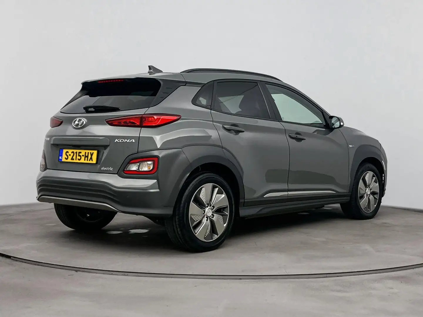 Hyundai KONA EV Premium 64 kWh | Leder | Carplay&Navi | Stoel v Grau - 2