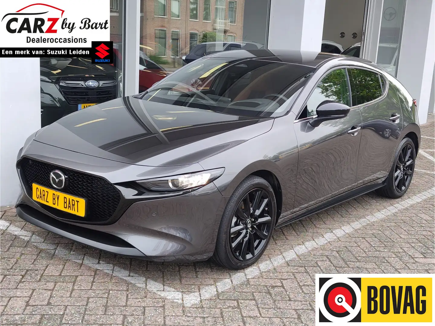 Mazda 3 2.0 e-SKYACTIV-G M HYBRID 122 NAGISA Alcantara | E Grijs - 1