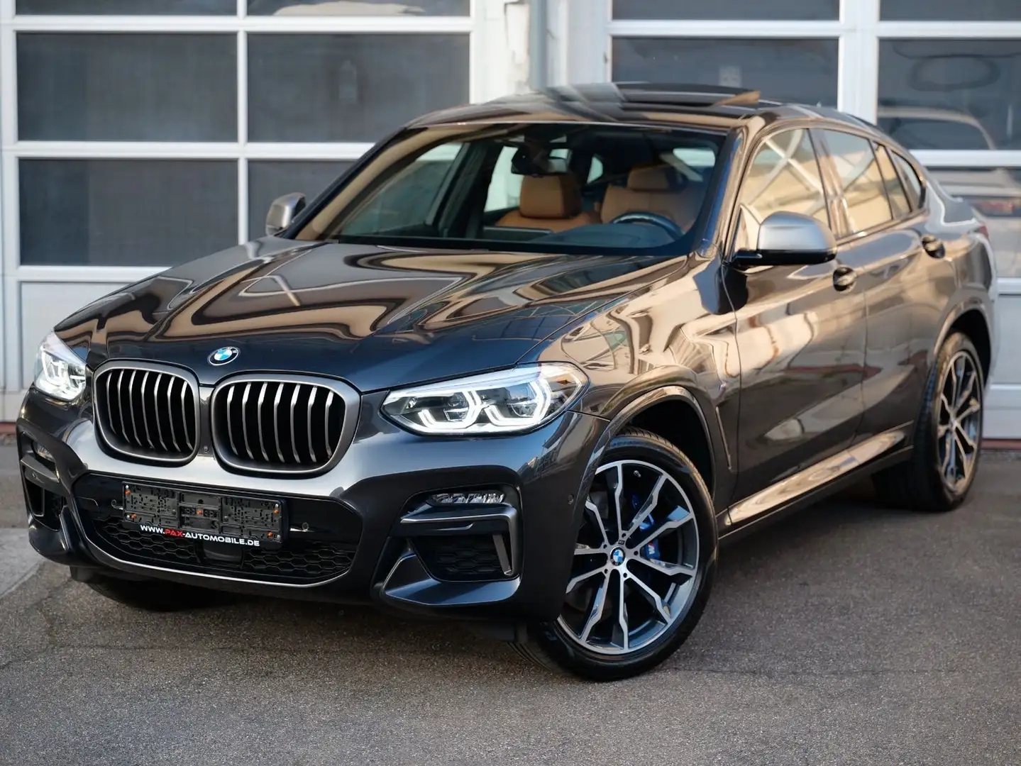 BMW X4 M d PANO+STANDHZNG+aLED+ACC+HUD+360°+HARMAN Grijs - 1