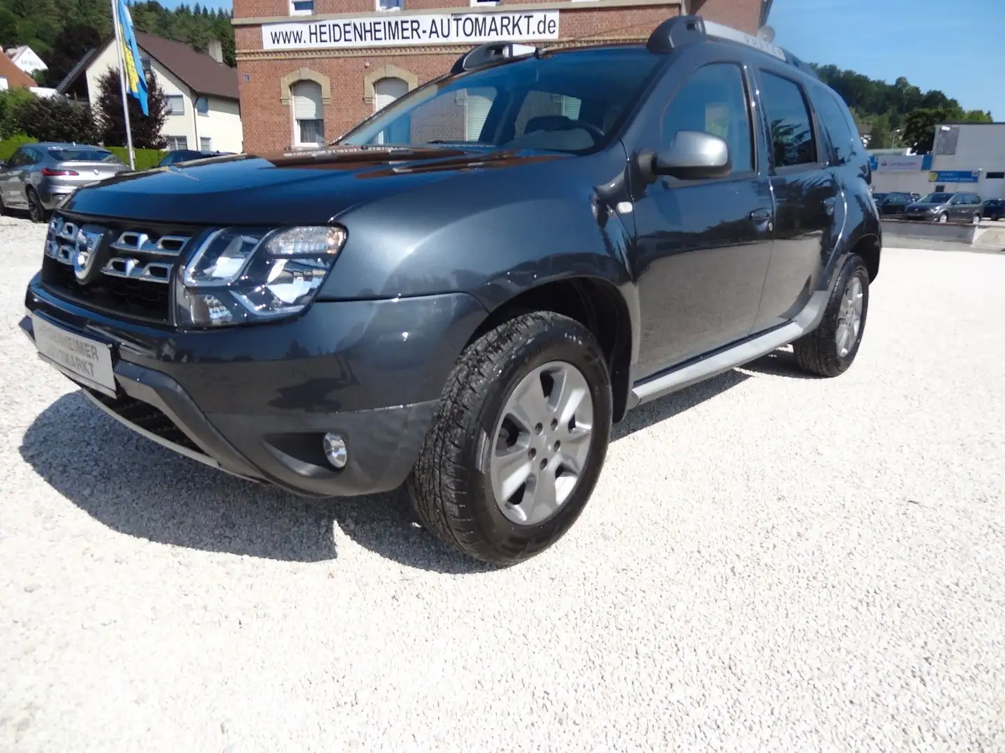 Dacia Duster I Prestige 4x4/1.Hd/Klima/Leder/AHK/Navi/ Grau - 1