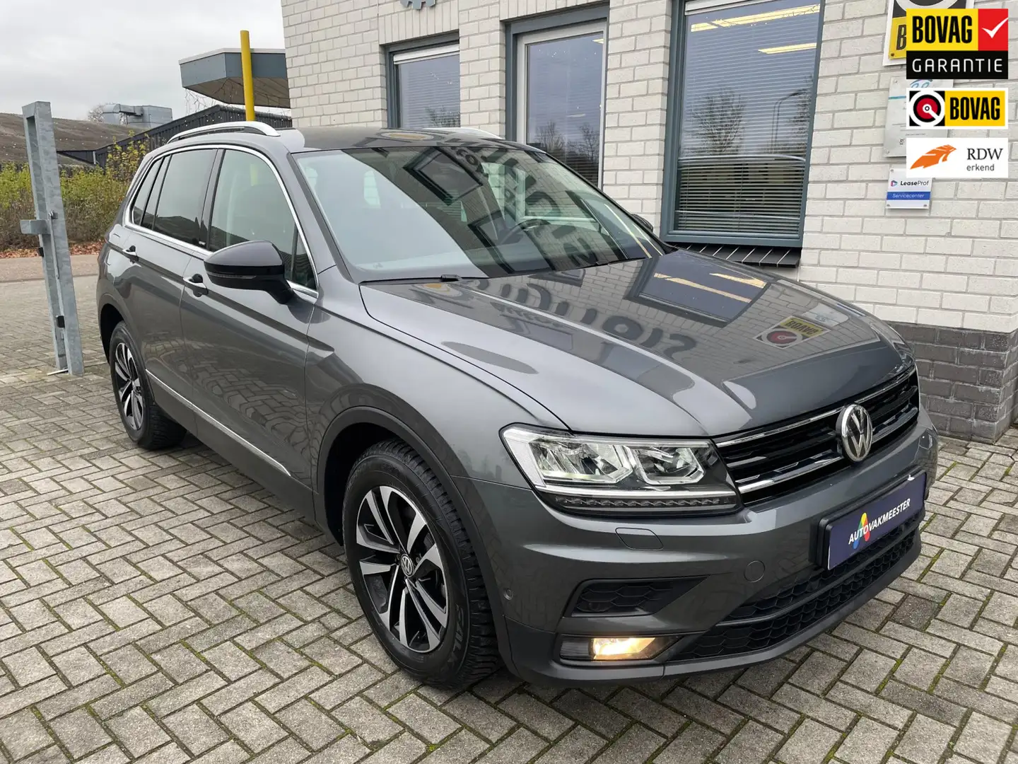Volkswagen Tiguan 1.5 TSI Comfortline Business / Add. Cruise / Clima Gris - 1