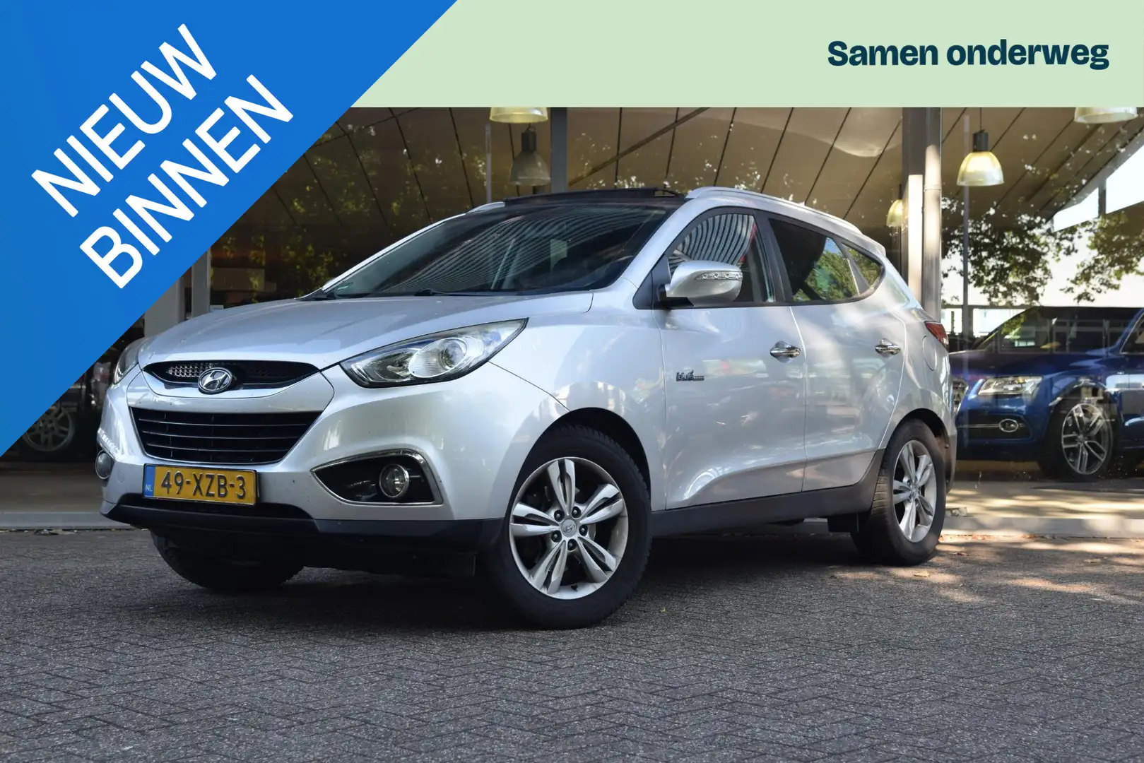 Hyundai iX35 1.6i GDI Style Panoramadak, Navigatie, Cruise, Cam Grau - 1