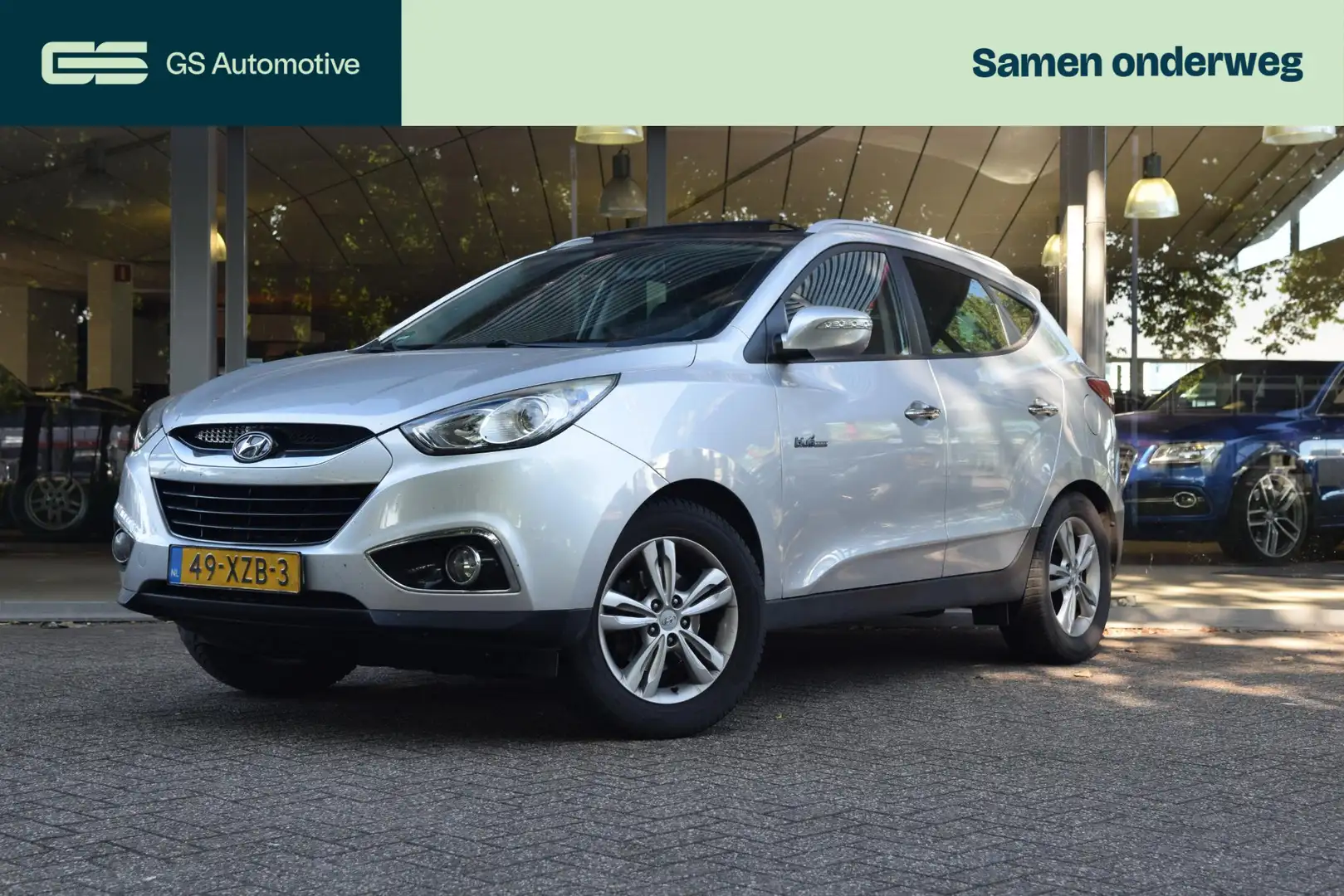 Hyundai iX35 1.6i GDI Style Panoramadak, Navigatie, Cruise, Cam Grijs - 1