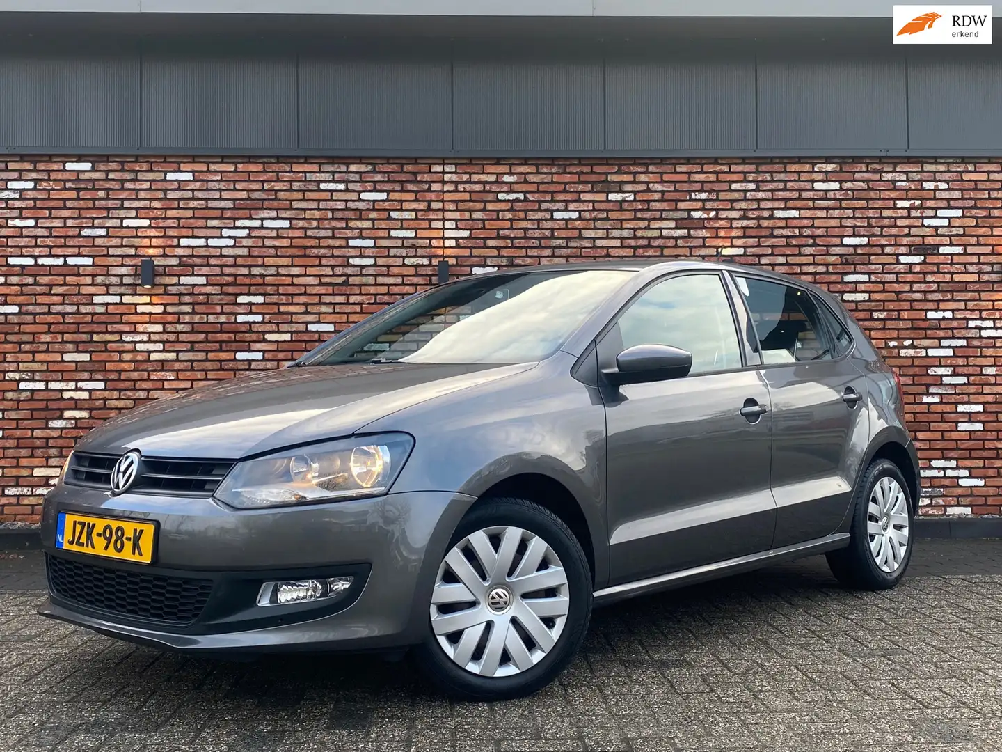 Volkswagen Polo 1.2-12V Comfortline 5deurs Trekhaak 144000km! Grau - 1
