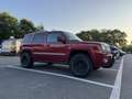 Jeep Patriot 2.4 Ltd Liberty Rood - thumbnail 1