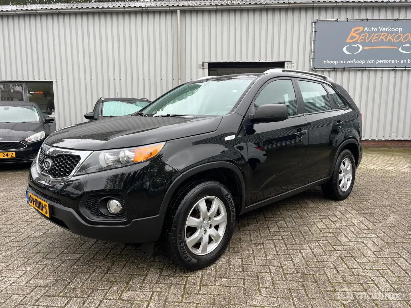 Kia Sorento 2.4 X-tra Zwart - 1