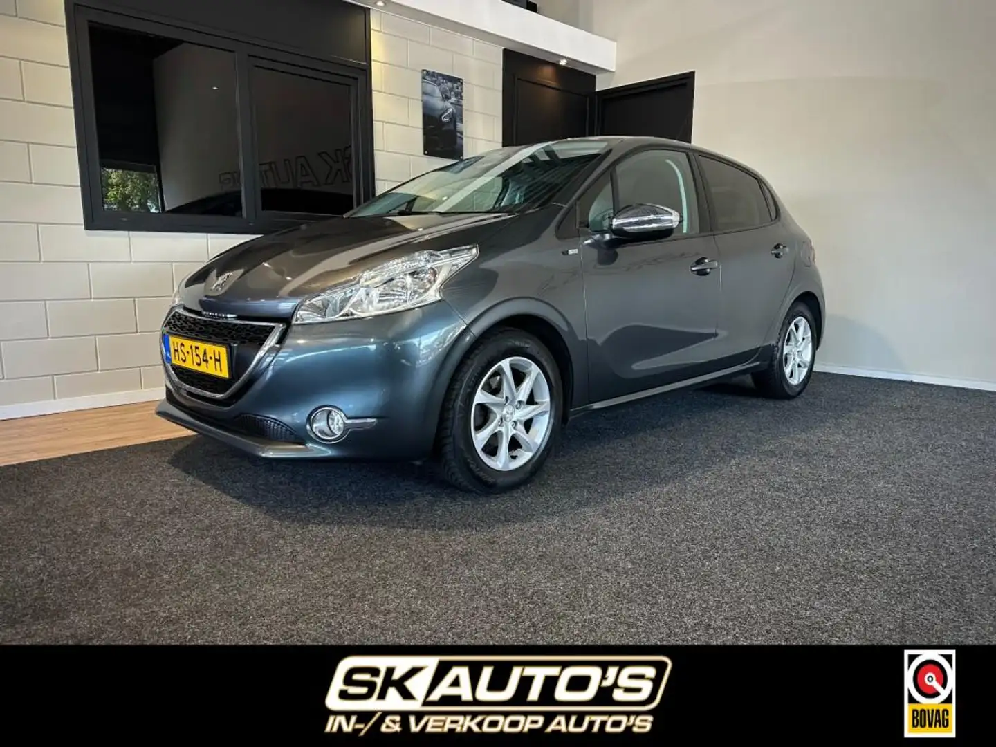 Peugeot 208 1.2 PURETECH STYLE RIJKLAAR l LMV l NAVI l AIRCO l Grijs - 1
