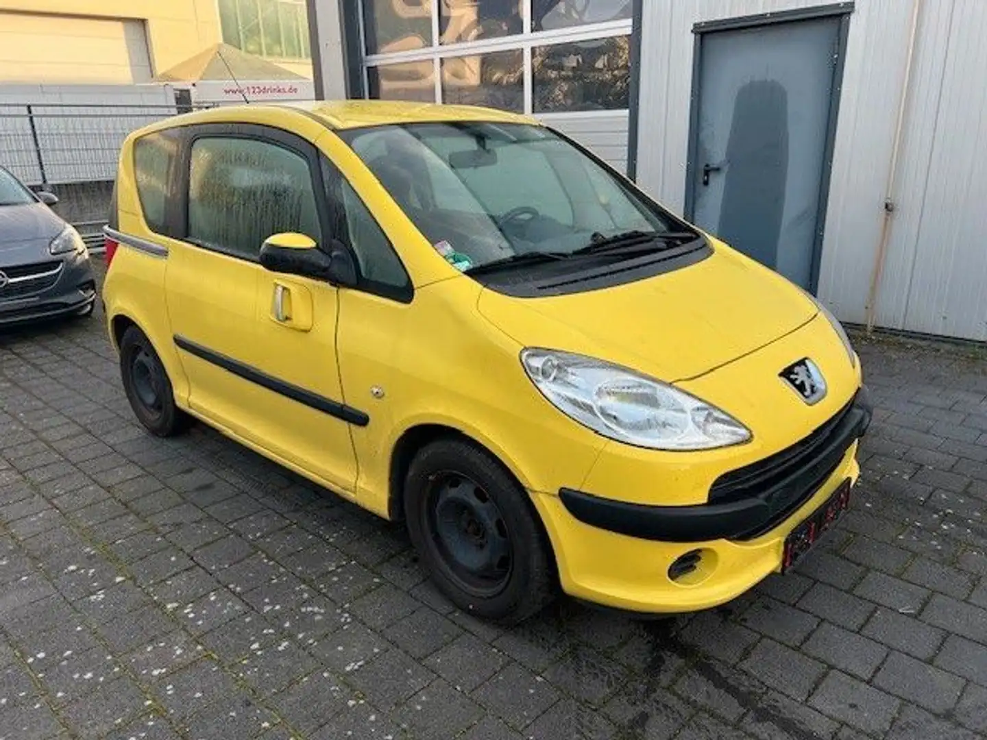 Peugeot 1007 Filou Gelb - 1