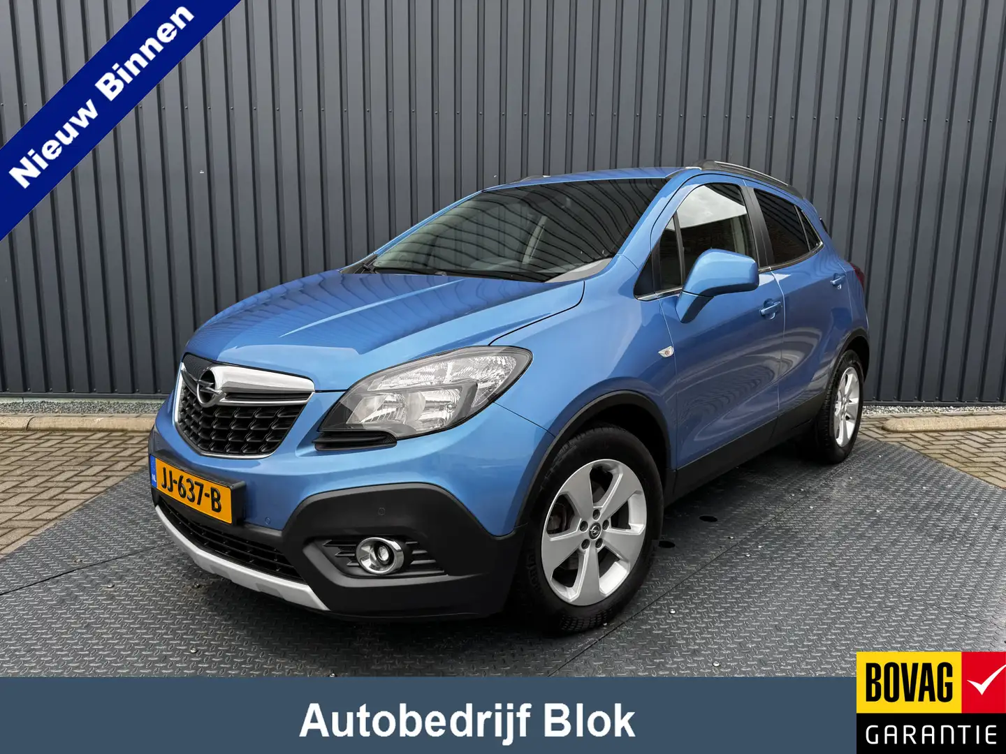 Opel Mokka 1.4 T 140Pk Cosmo | Trekhaak | Camera | AGR-Comfor Blauw - 1