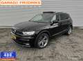 Volkswagen Tiguan 2.0 TSI 4Motion R-Line | Pano | Stoelverwarming | Zwart - thumbnail 1