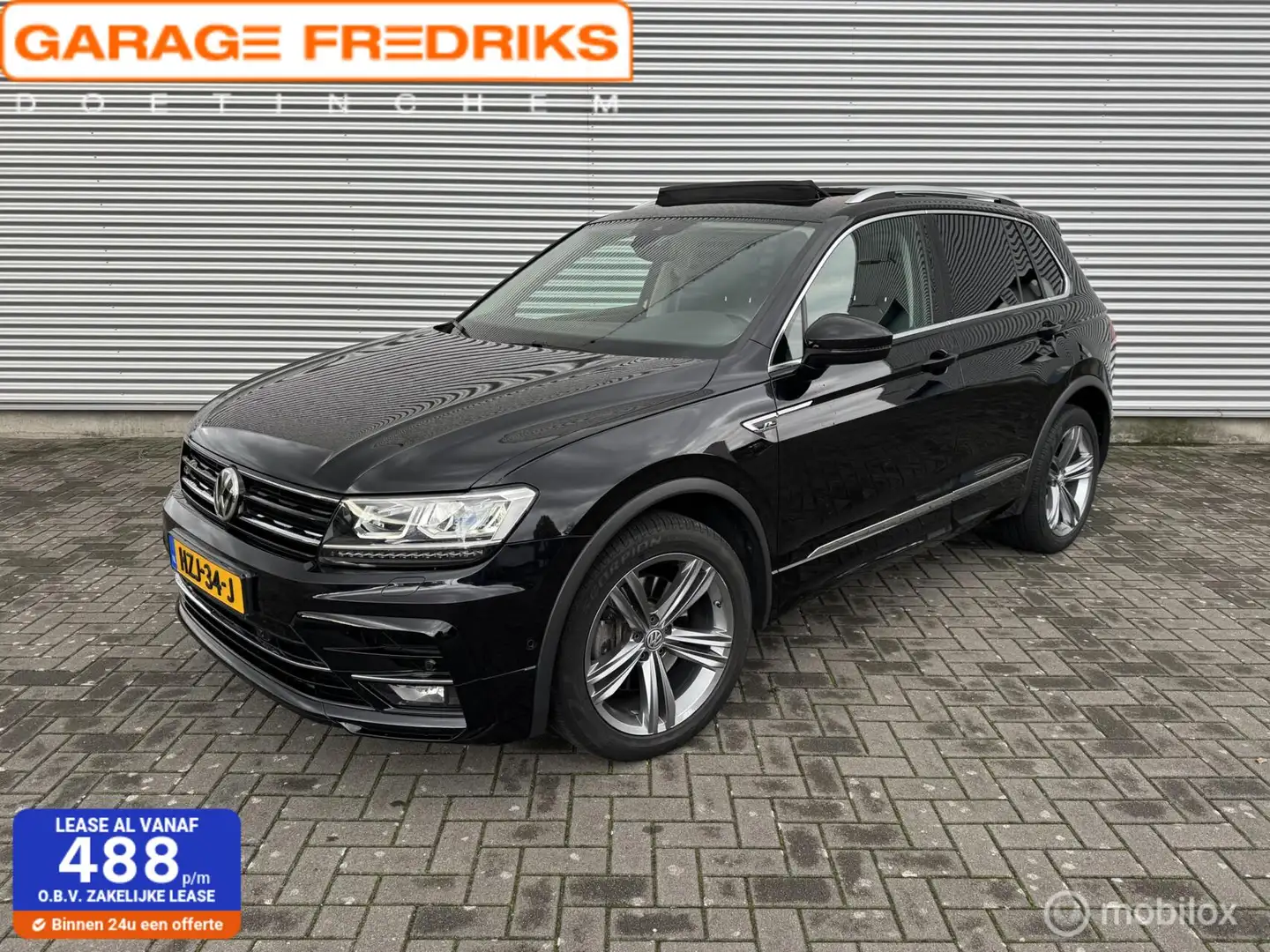 Volkswagen Tiguan 2.0 TSI 4Motion R-Line | Pano | Stoelverwarming | Zwart - 1