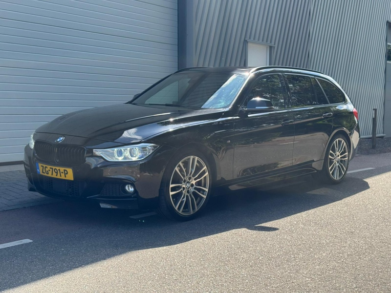 BMW 335 3-serie Touring 335i xDrive High Executive | Trekh
