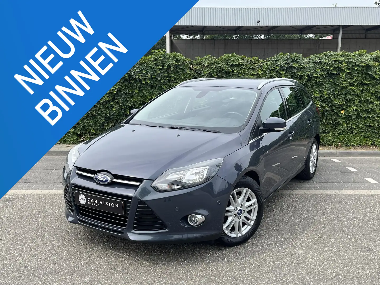 Ford Focus Wagon 1.0 EcoBoost Titanium * Navi * Cruise * Apk Grijs - 1