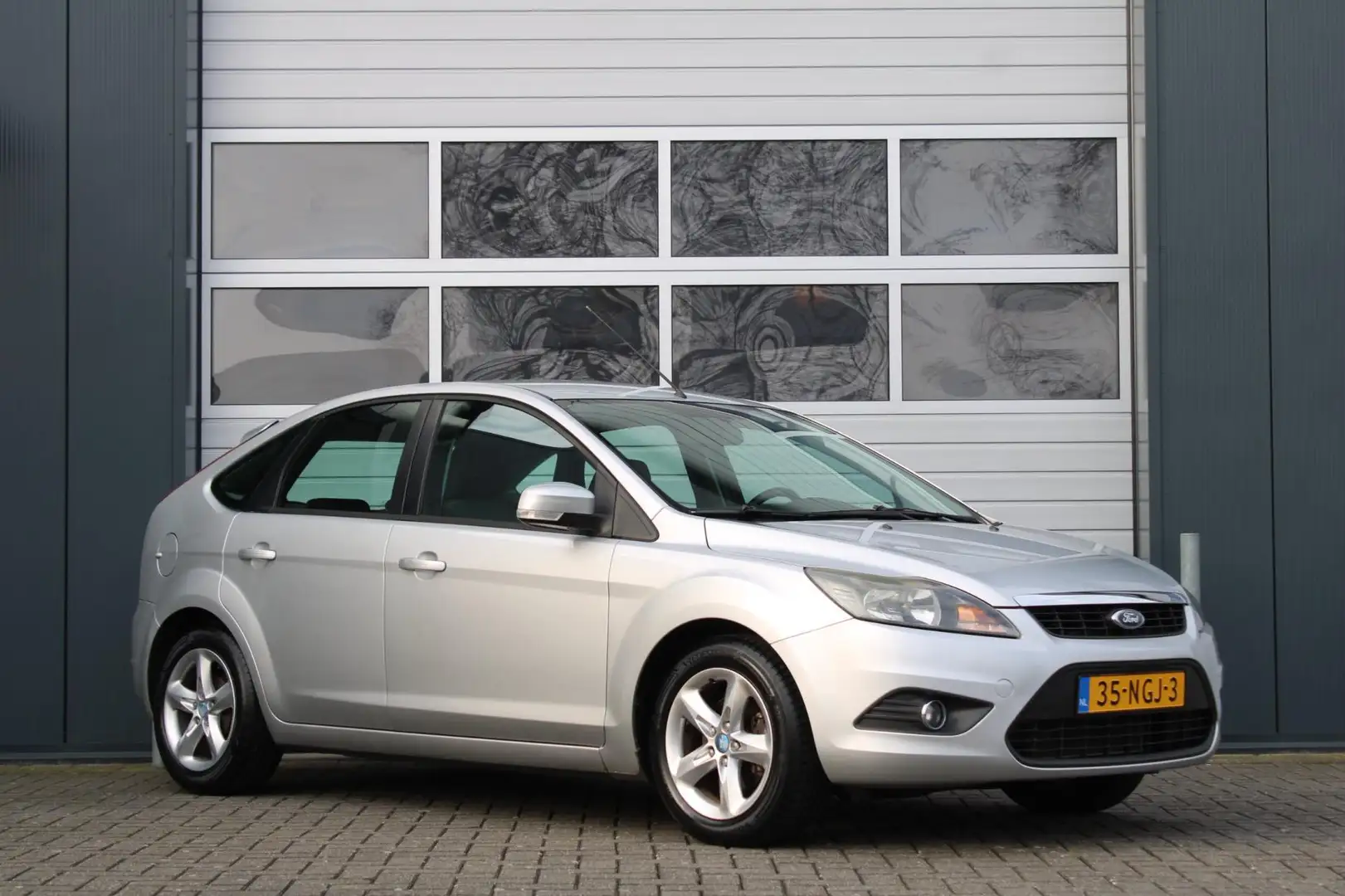 Ford Focus 1.6 Comfort 5-Deurs Airco/Cruise/Bluetooth/Elek.Ra Gris - 1