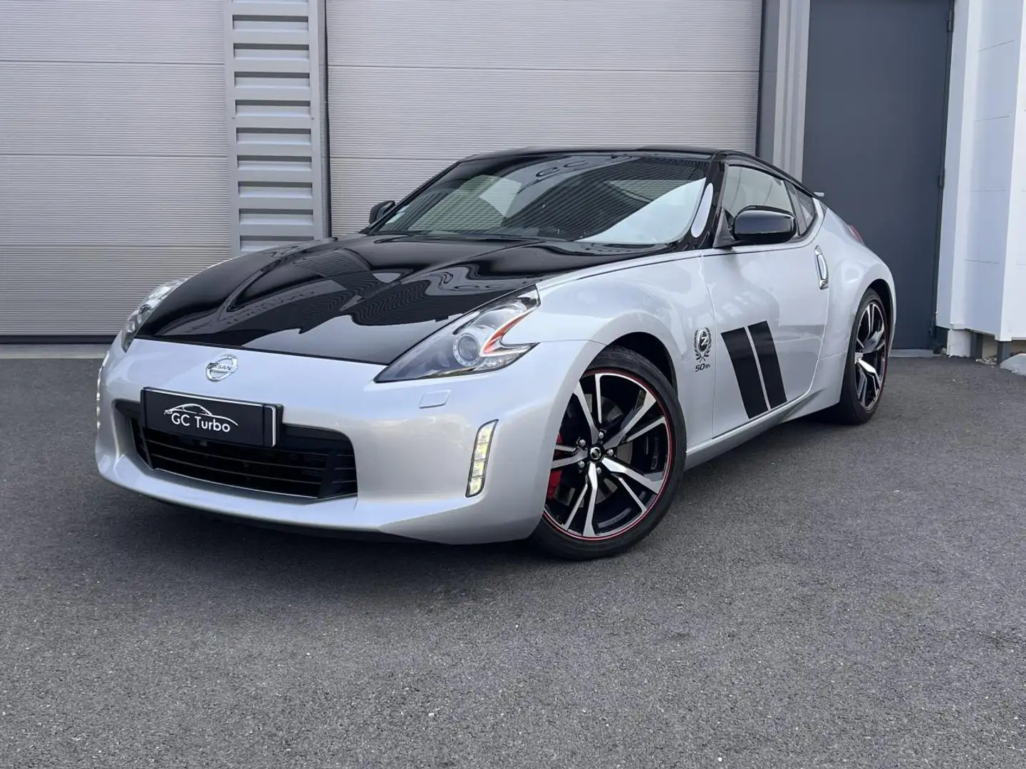 Nissan 370Z Coupé 3.7 V6 - 328 - BVA  COUPE 50ème anniversaire PHASE 2 Gris - 1