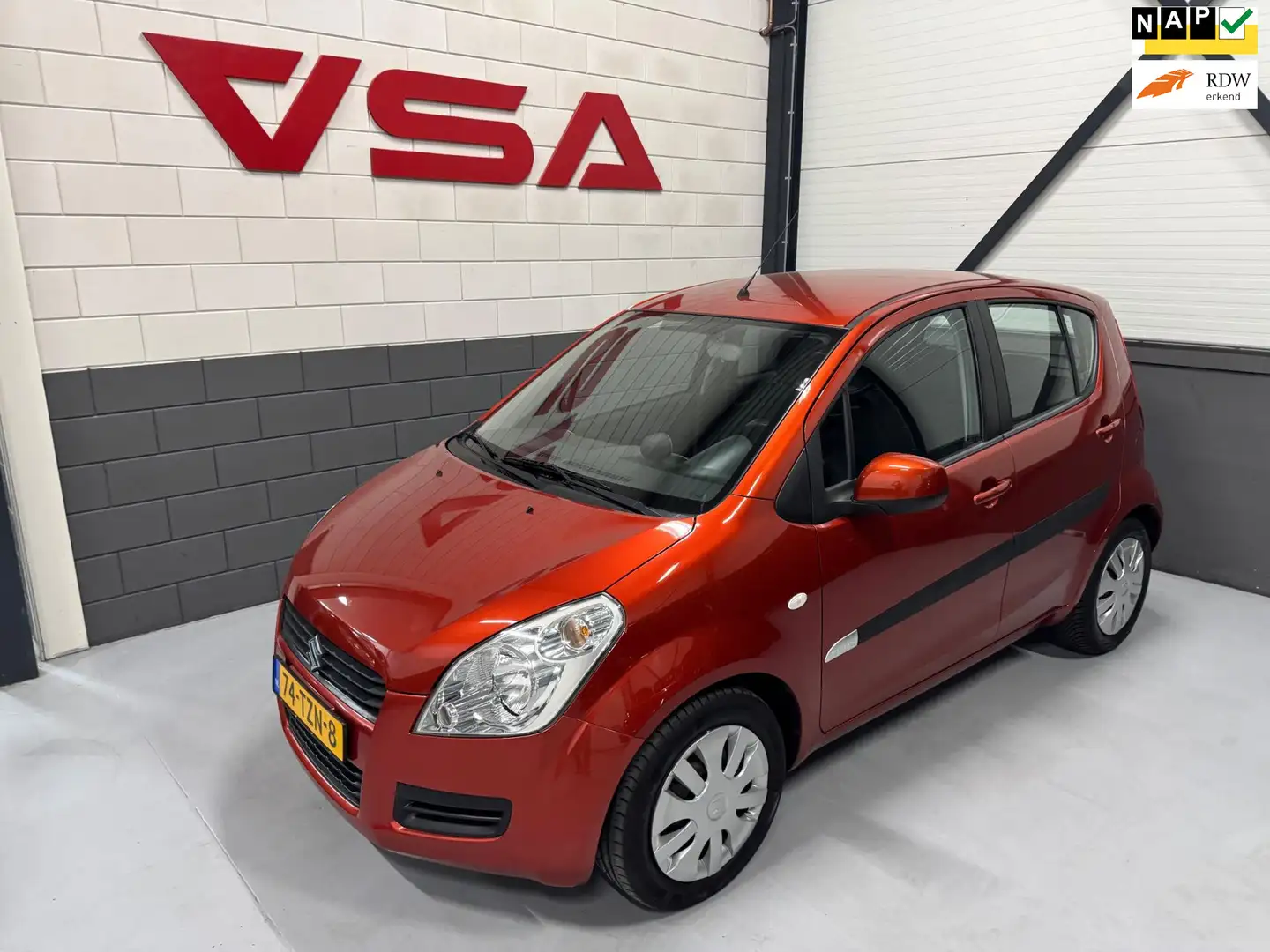 Suzuki Splash 1.0 VVT Comfort, Airco, NL auto, NAP! Orange - 1
