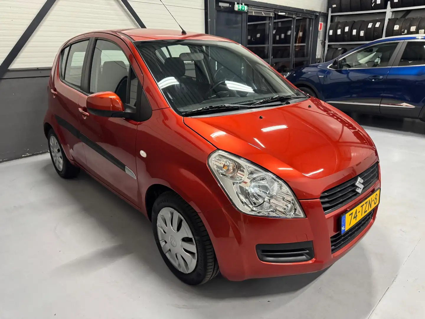Suzuki Splash 1.0 VVT Comfort, Airco, NL auto, NAP! Orange - 2