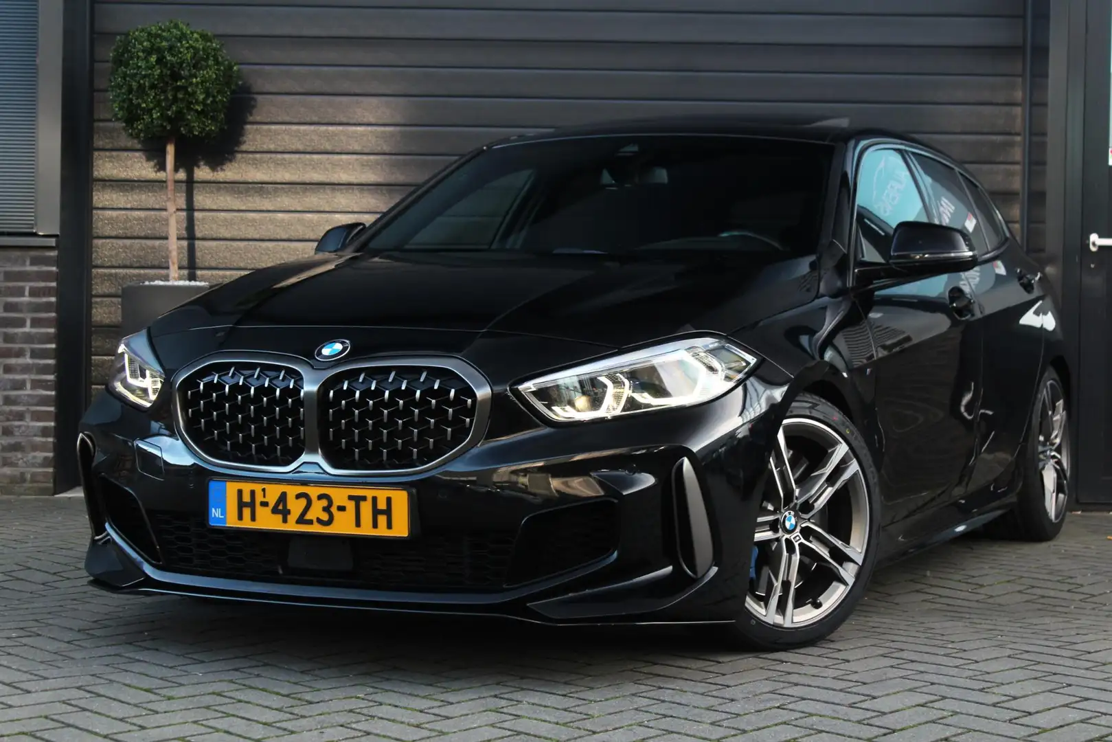 BMW 135 1-serie M135i xDrive High Executive Edition | Pano Noir - 1