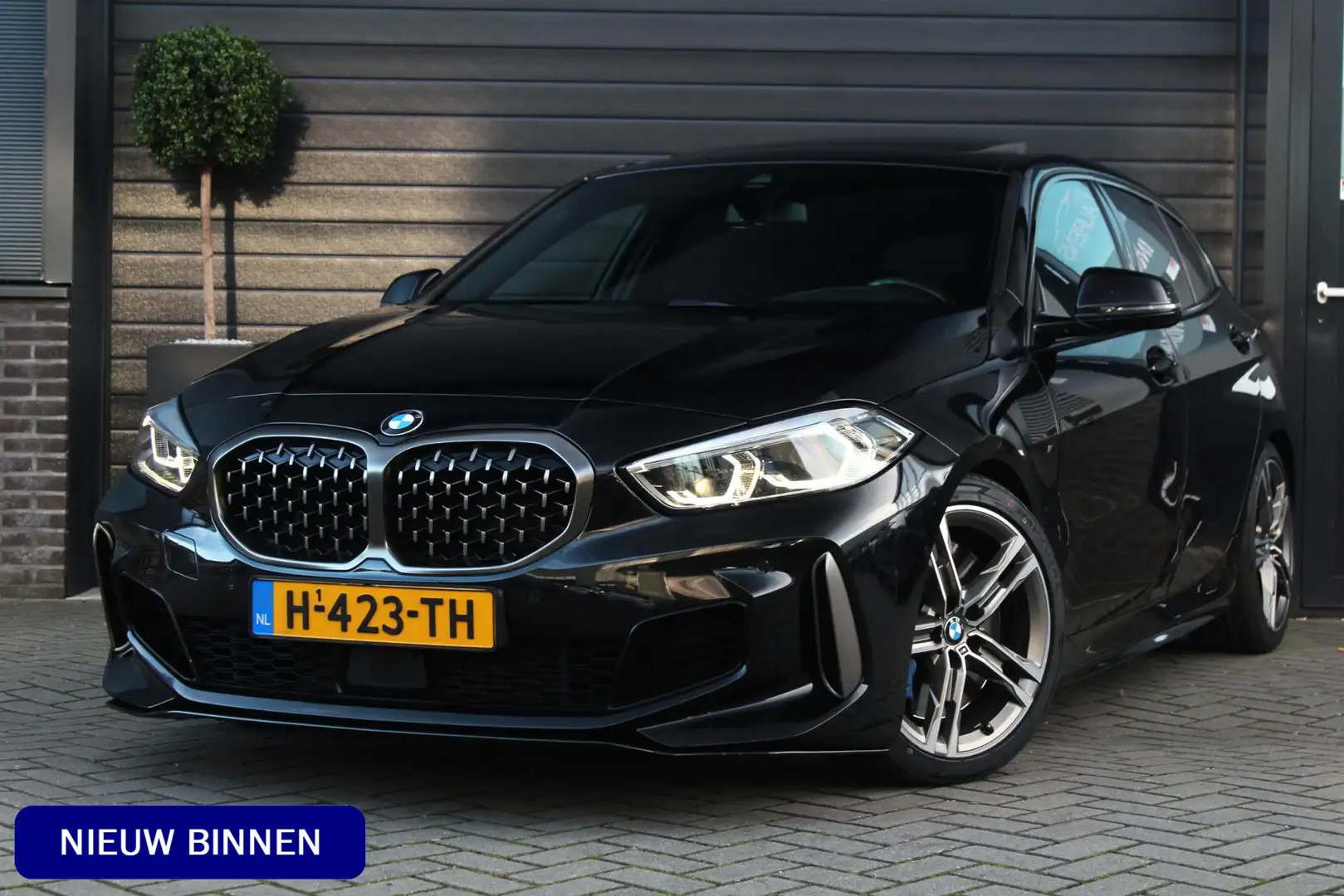 BMW 135 1-serie M135i xDrive High Executive Edition | Pano Noir - 1